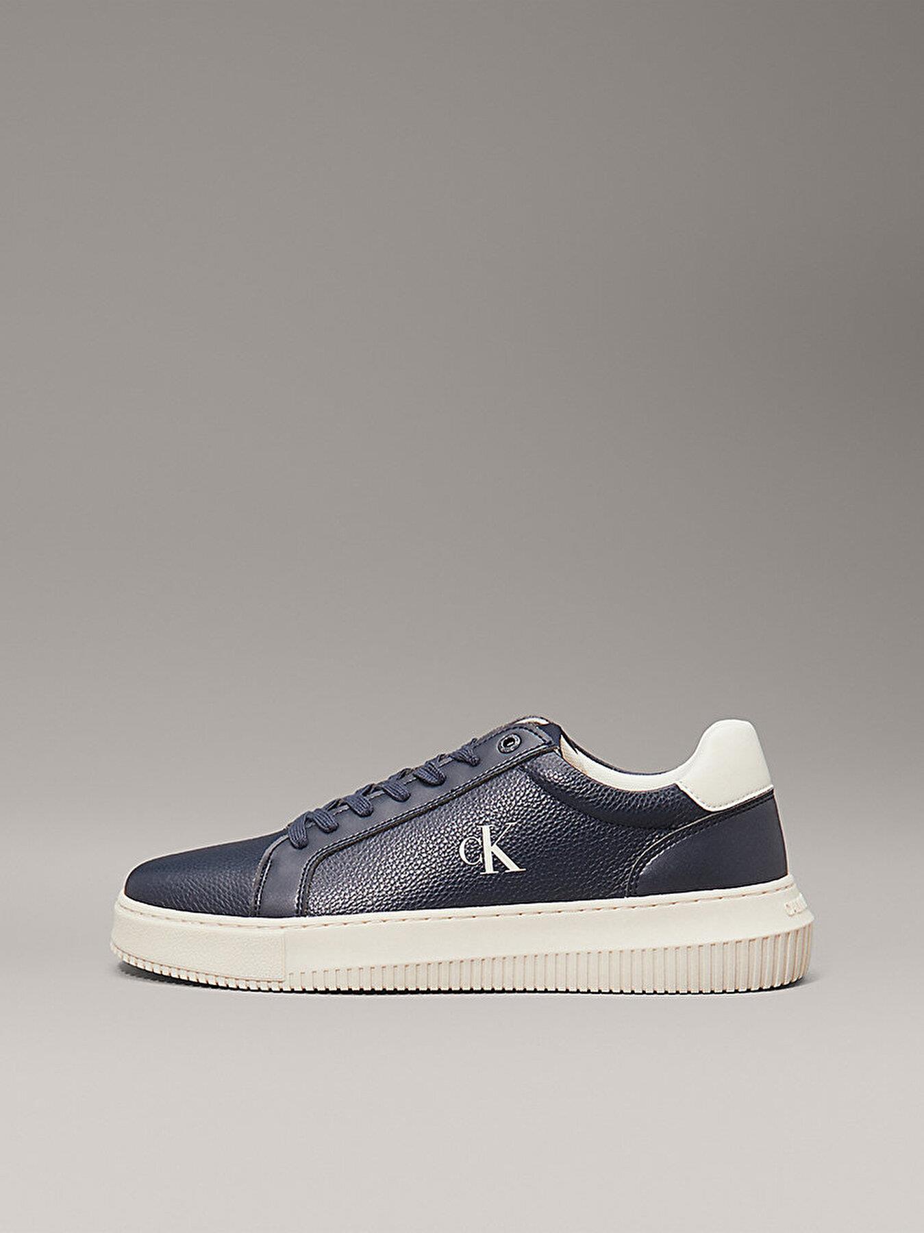 Calvin Klein Calvin Klein Erkek Düşük Bilekli Deri Rahat ve Düz Tabanlı Logo Kabartmalı Lacivert Sneaker YM0YM01198-0G1