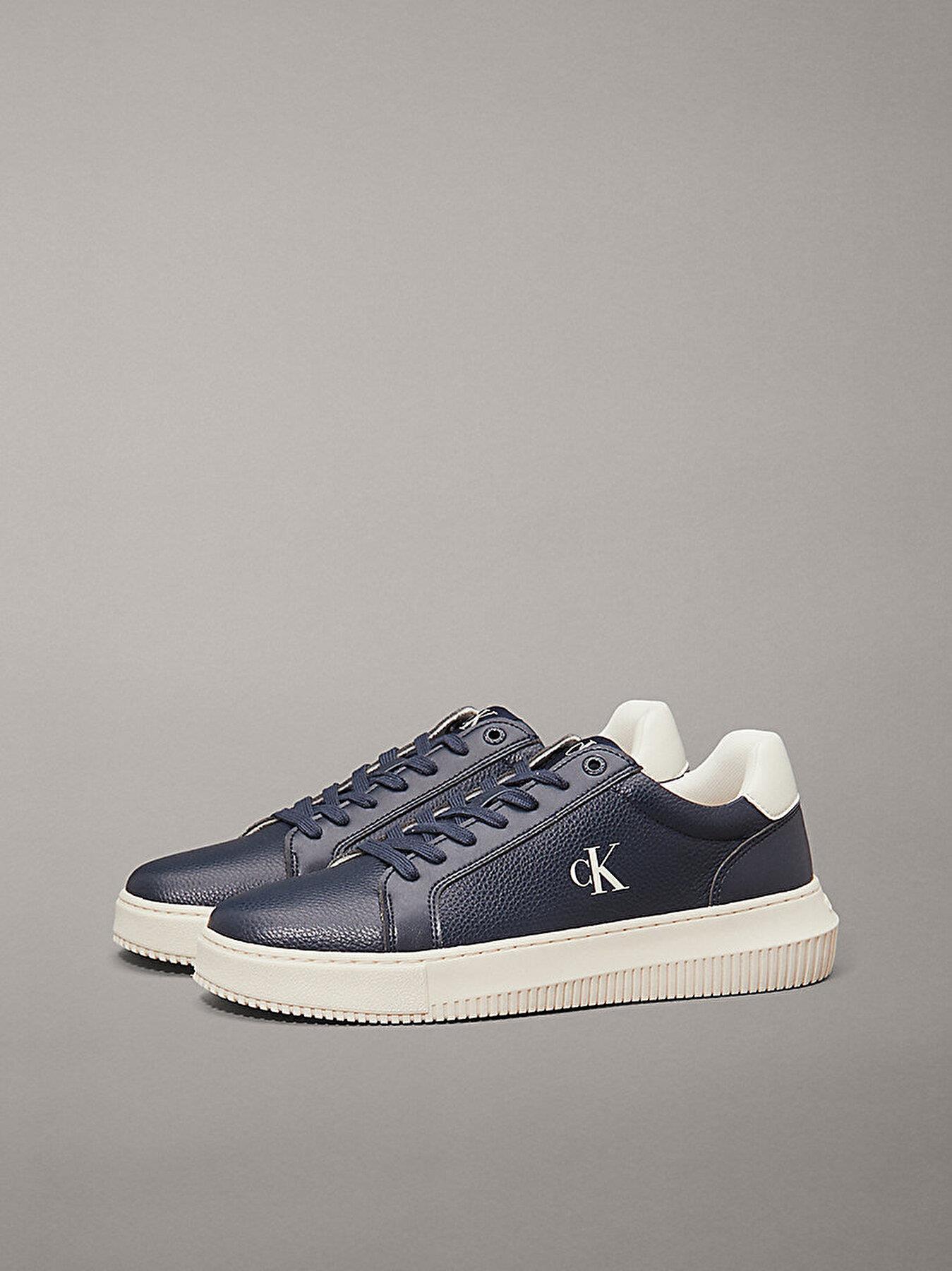 Calvin Klein Calvin Klein Erkek Düşük Bilekli Deri Rahat ve Düz Tabanlı Logo Kabartmalı Lacivert Sneaker YM0YM01198-0G1