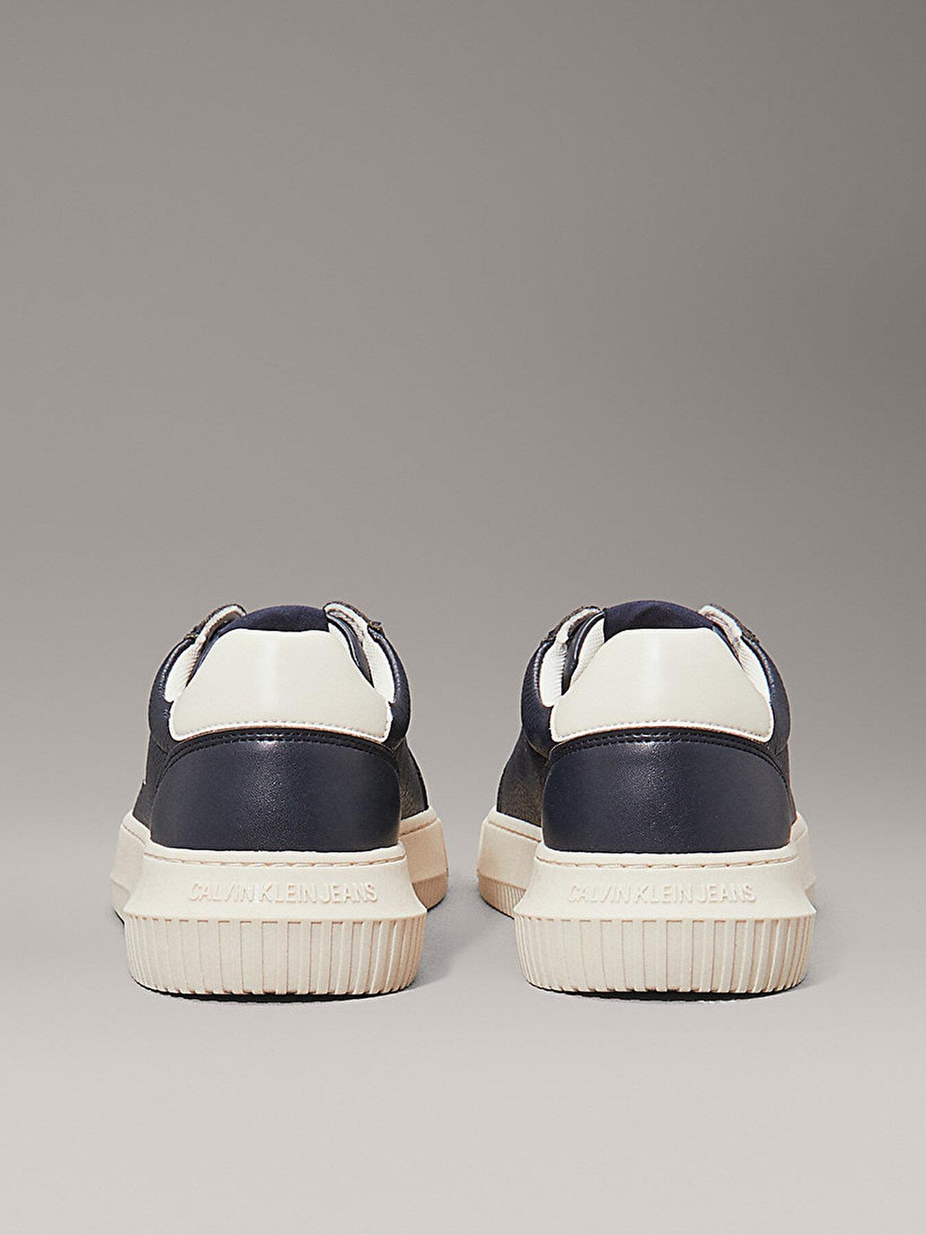 Calvin Klein Calvin Klein Erkek Düşük Bilekli Deri Rahat ve Düz Tabanlı Logo Kabartmalı Lacivert Sneaker YM0YM01198-0G1