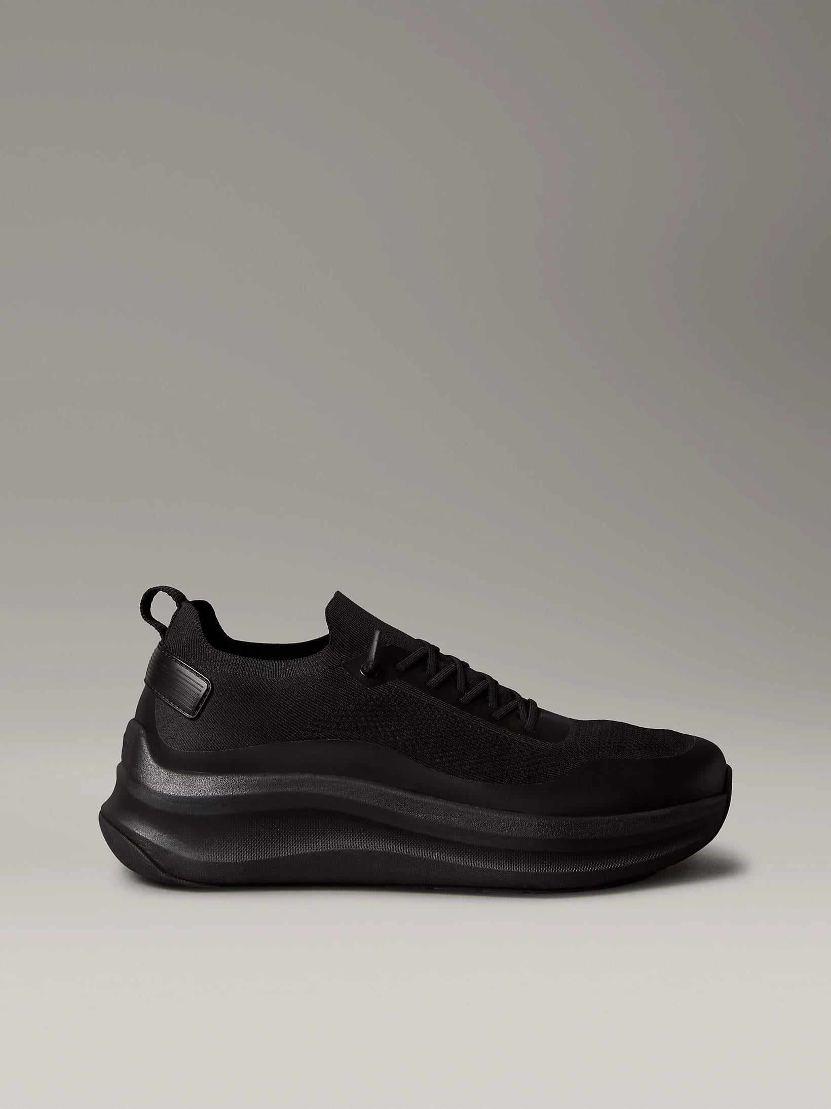 Calvin Klein Calvin Klein Erkek Kalın ve Rahat Tabanlı File Detaylı Siyah Sneaker YM0YM01457-0GJ