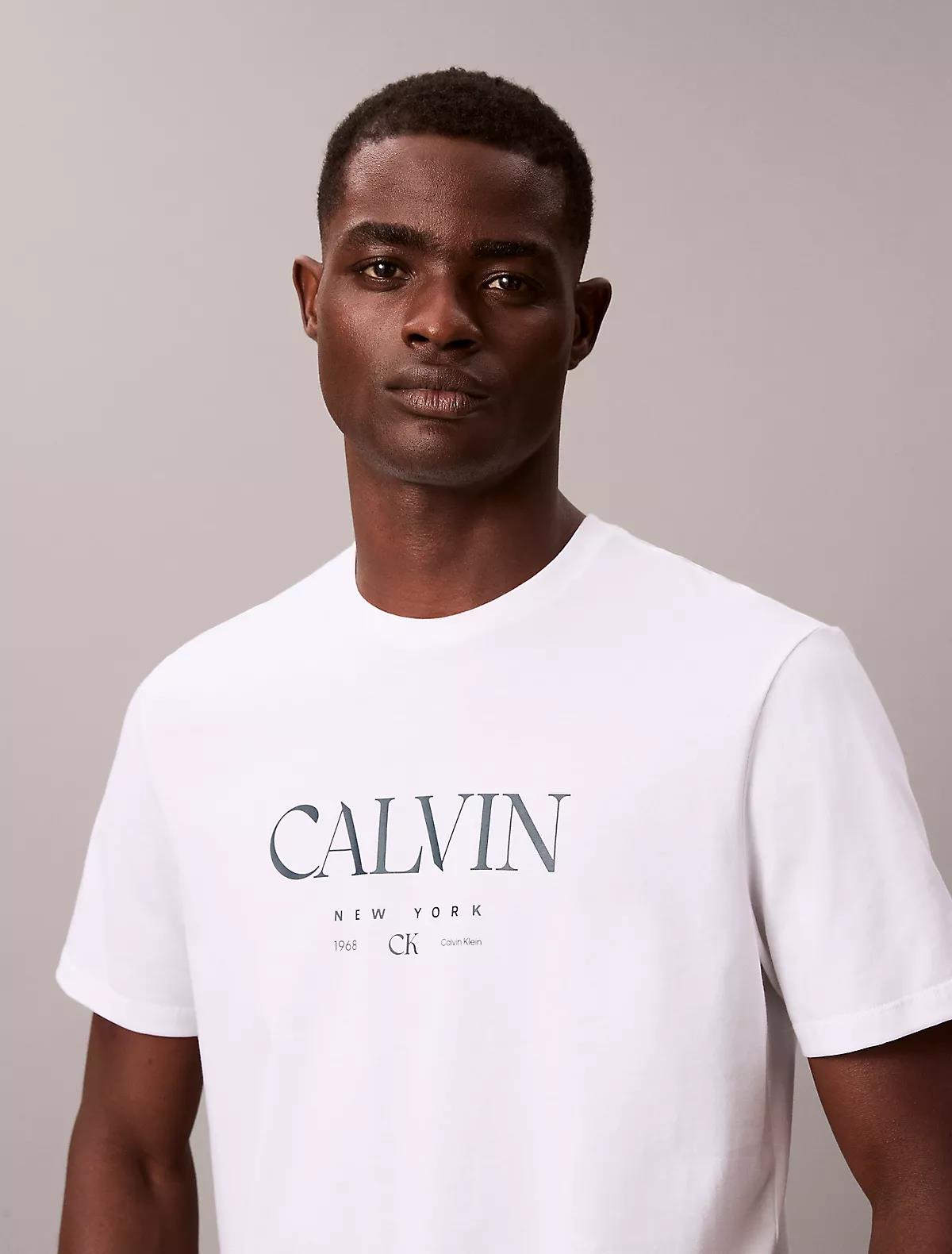 Calvin Klein Calvin Klein Erkek Kısa Kol Bisiklet Yaka CALVIN Yazı Desenli Pamuklu Beyaz T-Shirt LV04RE807G-YAA
