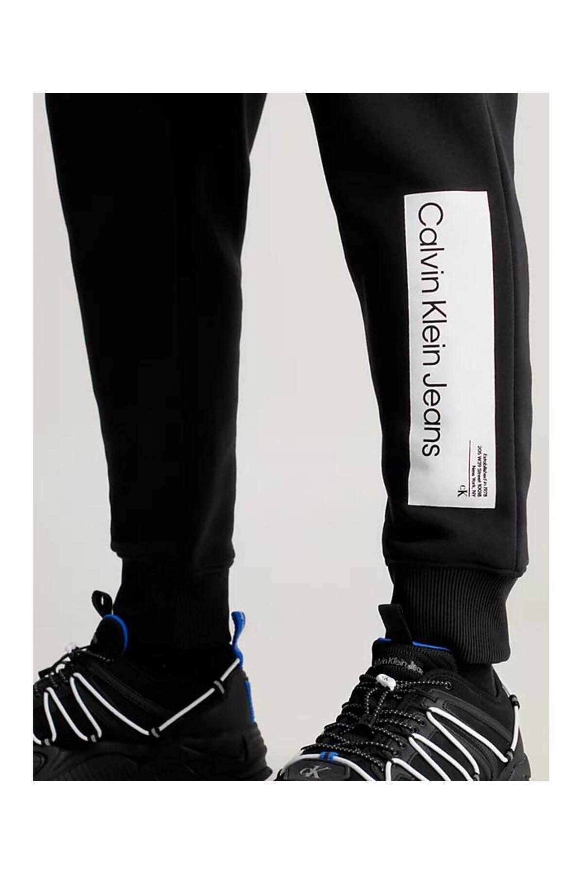 Calvin Klein Calvin Kleın Erkek Logolu Beli Ve Paçası Lastikli Cepli Siyah Eşofman Altı J30J324053-BEH