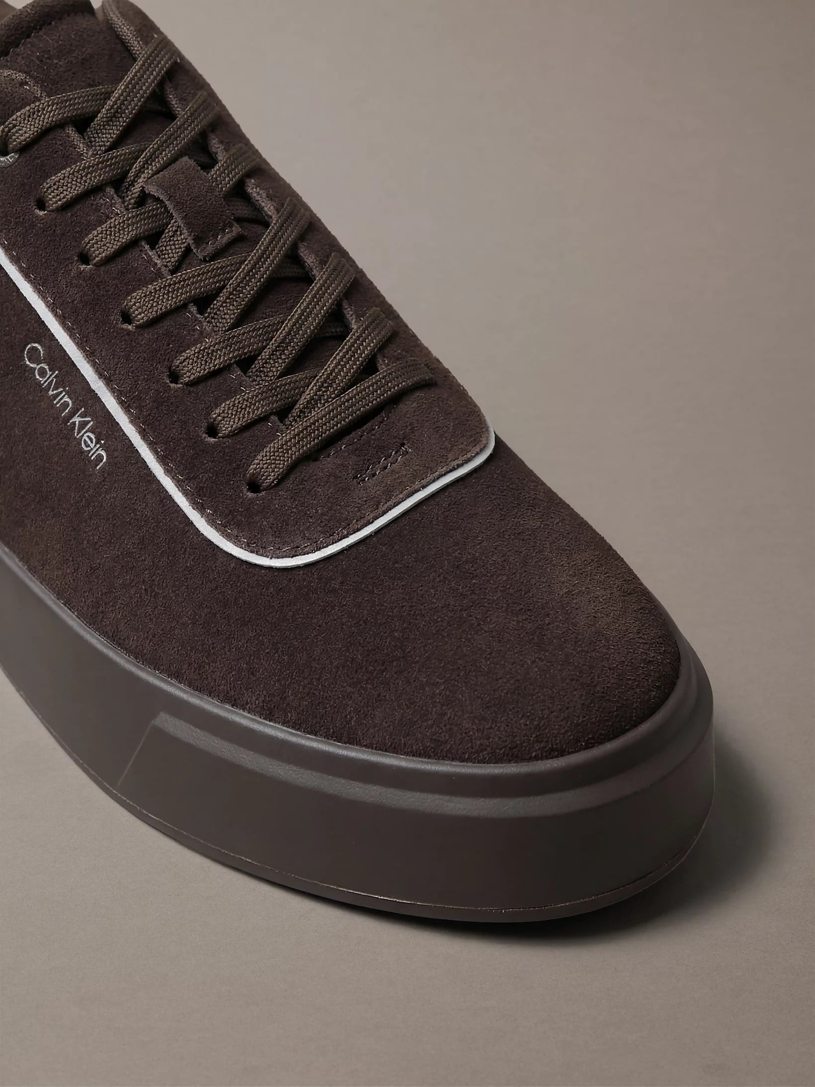 Calvin Klein Calvin Klein Erkek Monogram Logo Desenli Yuvarlak Burunlu Rahat Taban Koyu Kahve Sneaker HM0HM02203-BAM
