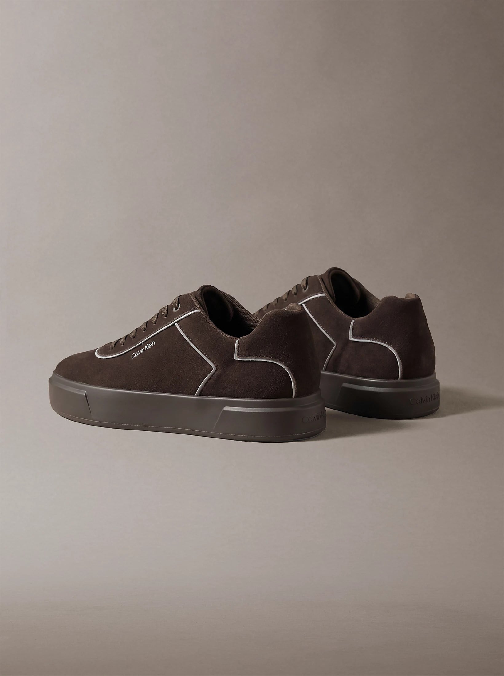 Calvin Klein Calvin Klein Erkek Monogram Logo Desenli Yuvarlak Burunlu Rahat Taban Koyu Kahve Sneaker HM0HM02203-BAM