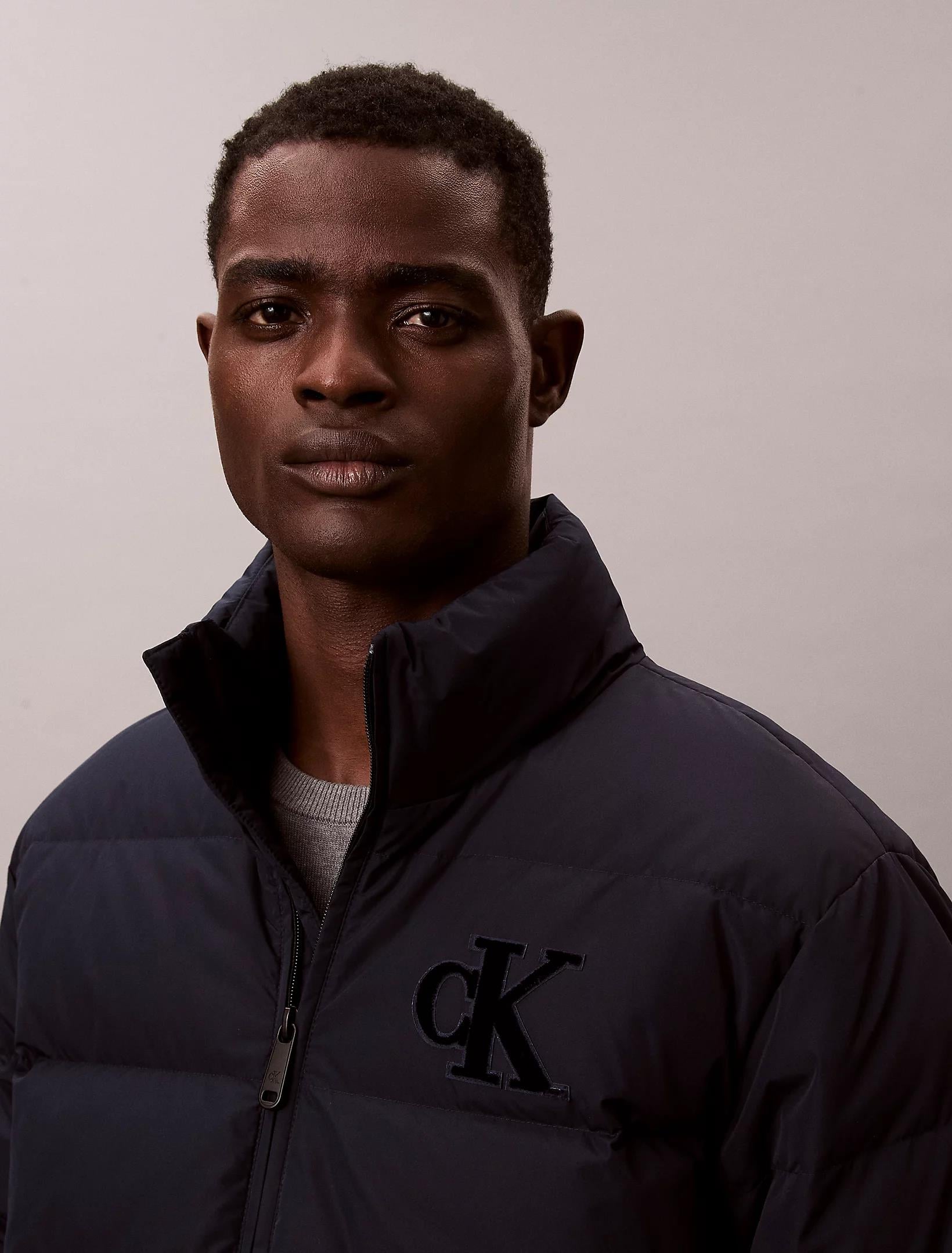 Calvin Klein Calvin Klein Erkek Normal Kalıp Kapitone Desenli Dik Yakalı CK Logolu Lacivert Ceket LV14RE503G-CEF