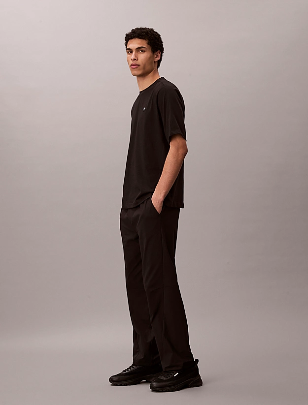 Calvin Klein Calvin Klein Erkek Regular Fit Yuvarlak Yakalı CK Logo Etiketli Kısa Kollu Siyah T-Shirt LVGMS6K112-UB1