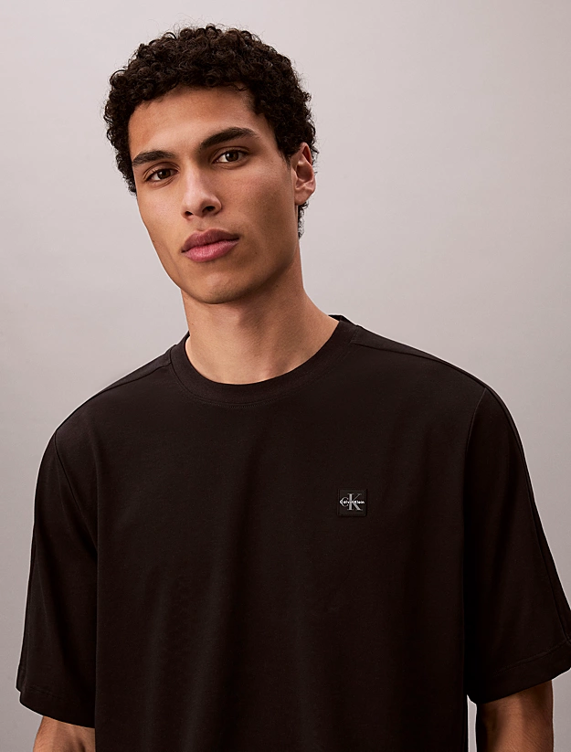 Calvin Klein Calvin Klein Erkek Regular Fit Yuvarlak Yakalı CK Logo Etiketli Kısa Kollu Siyah T-Shirt LVGMS6K112-UB1