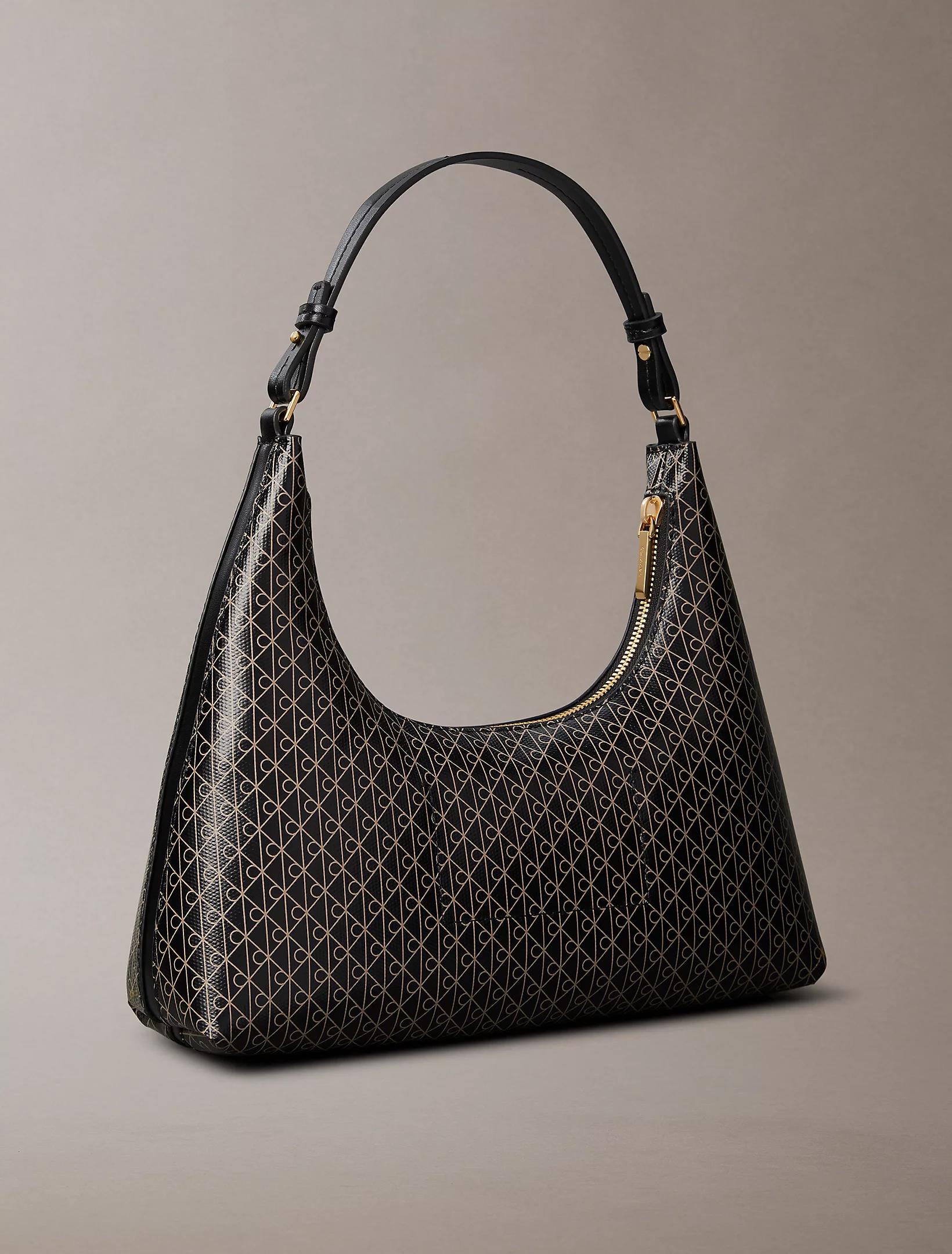 Calvin Klein Calvin Klein Kadın CK Monogram Logolu Fermuarlı Çıkarılabilir Omuz Askılı Siyah Omuz Çantası LV04F3298G-2XA