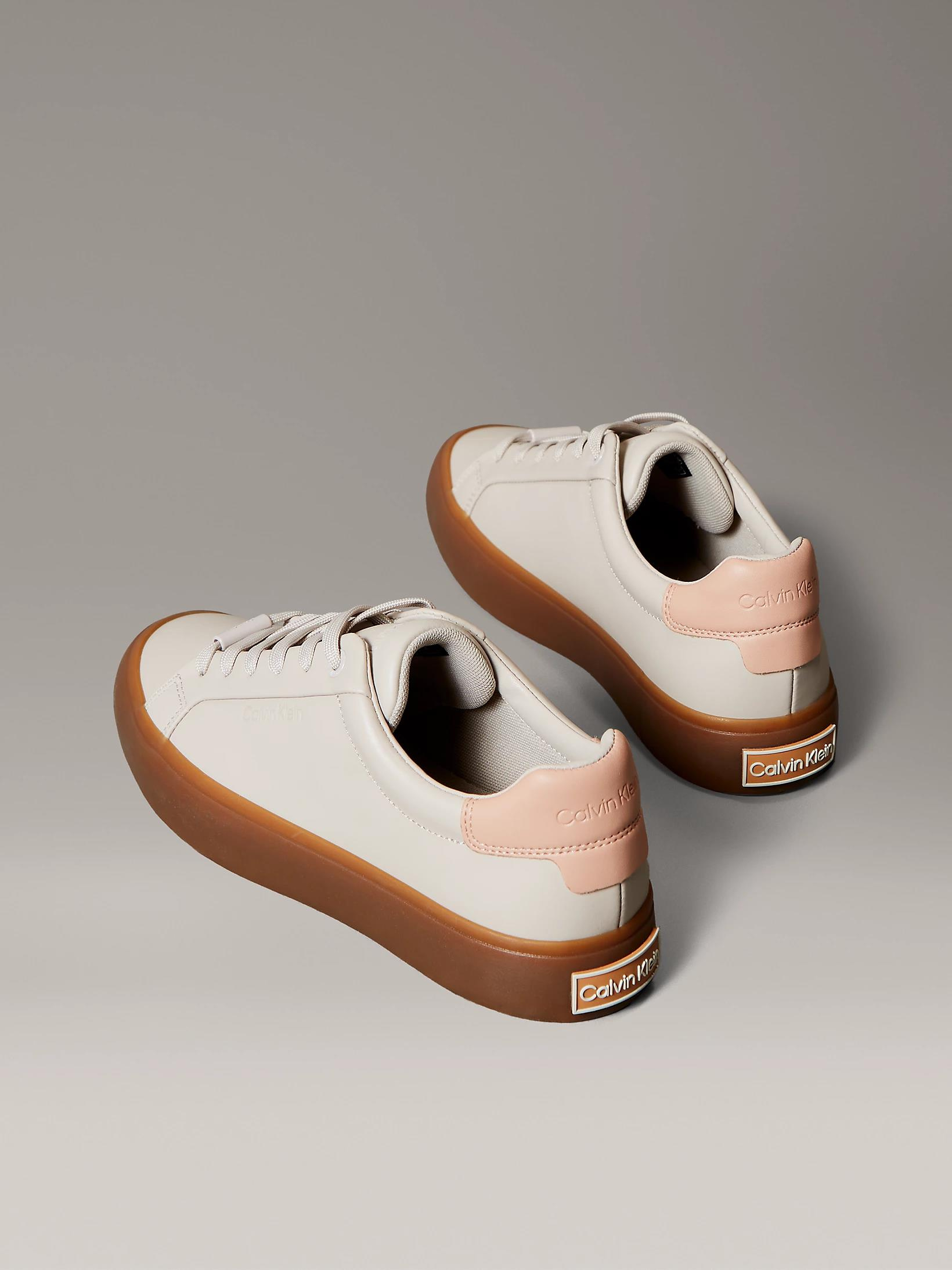 Calvin Klein Calvin Klein Kadın Deri Bağlamalı Rahat Taban CK Yazı Detay Bej Sneaker HW0HW02673-0IV