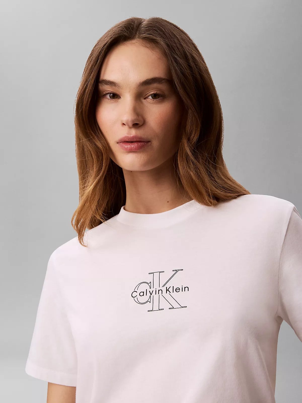 Calvin Klein Calvin Klein Kadın Normal Kesim Pamuklu Yuvarlak Yakalı CK Logo Baskılı Kısa Kollu Beyaz T-Shirt LV047G831G-YAF