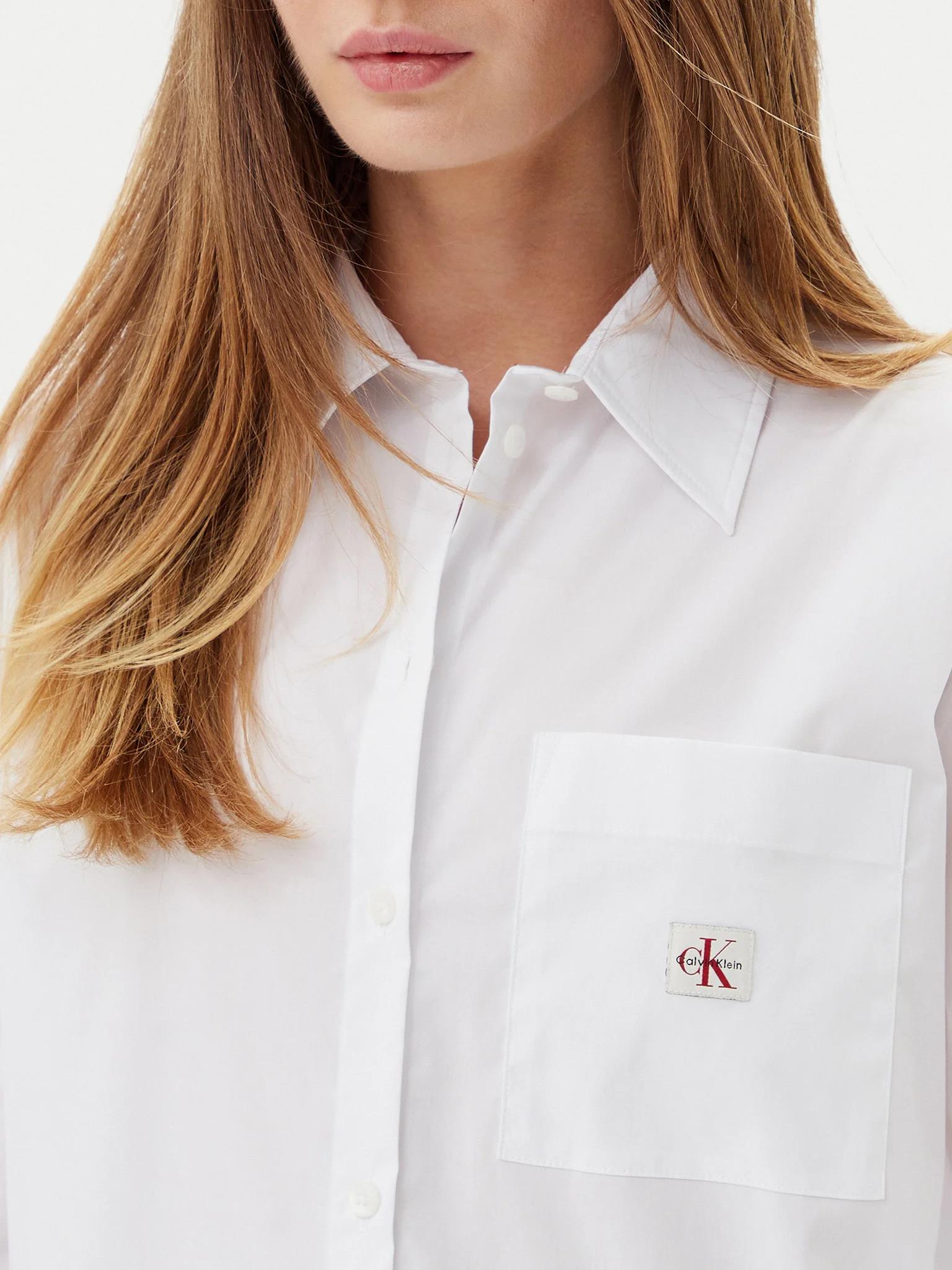 Calvin Klein Calvin Klein Kadın Rahat Kalıp Cep Detaylı Pamuklu Uzun Kollu Beyaz Gömlek LV047C143G-YAA