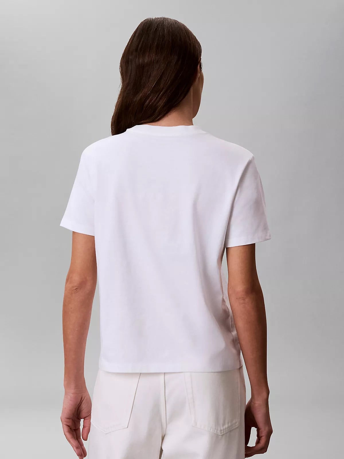 Calvin Klein Calvin Klein Kadın Regular Fit Yuvarlak Yakalı Logo Baskılı Kısa Kollu Crop Beyaz T-Shirt LV044G801G-YAF