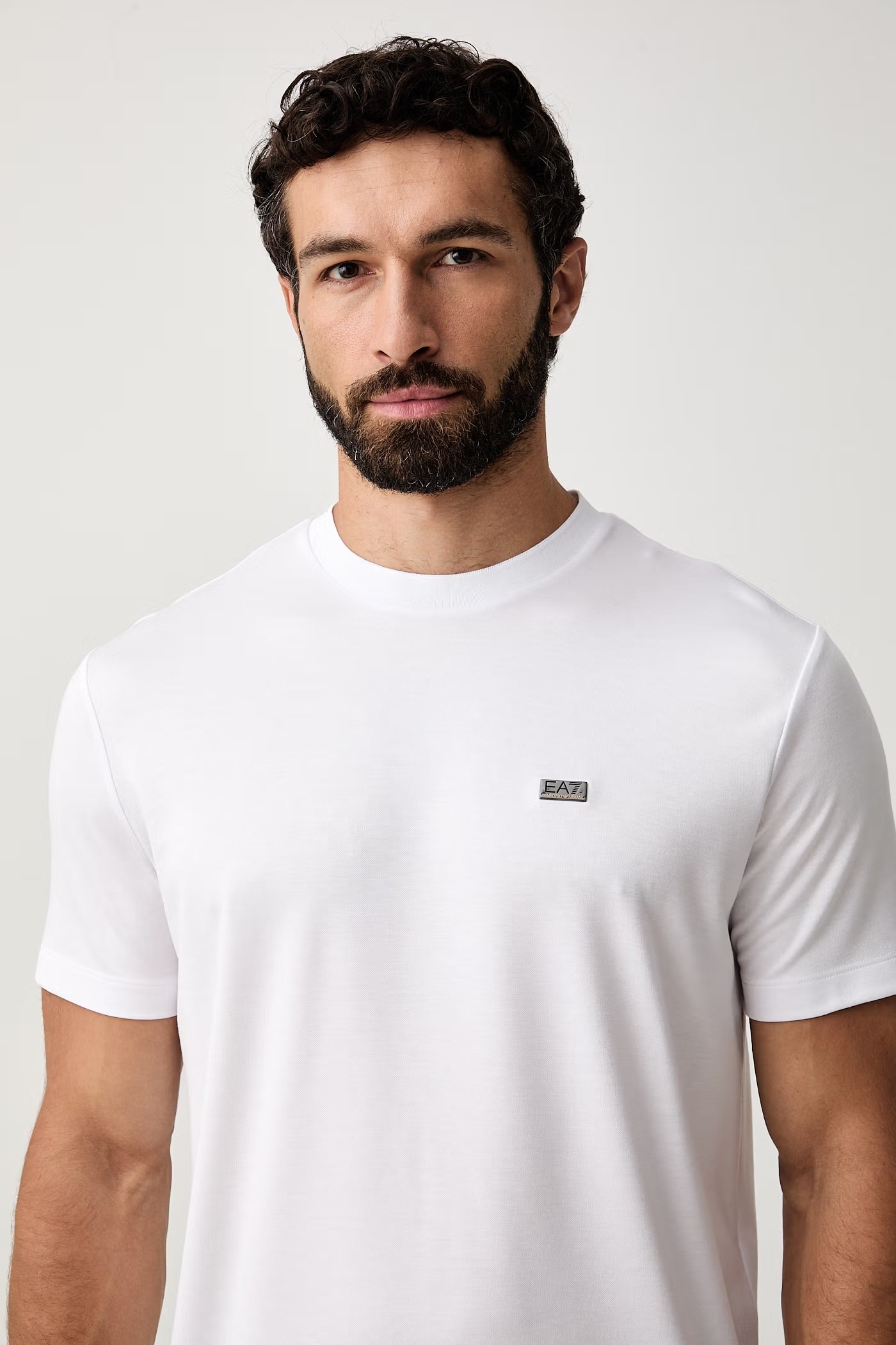 EA7 Ea7 Erkek Normal Kalıp Yumuşak Dokuma Kumaşlı Plaka Logolu Kısa Kollu Beyaz T-Shirt 7M002096 AF13862-U0002