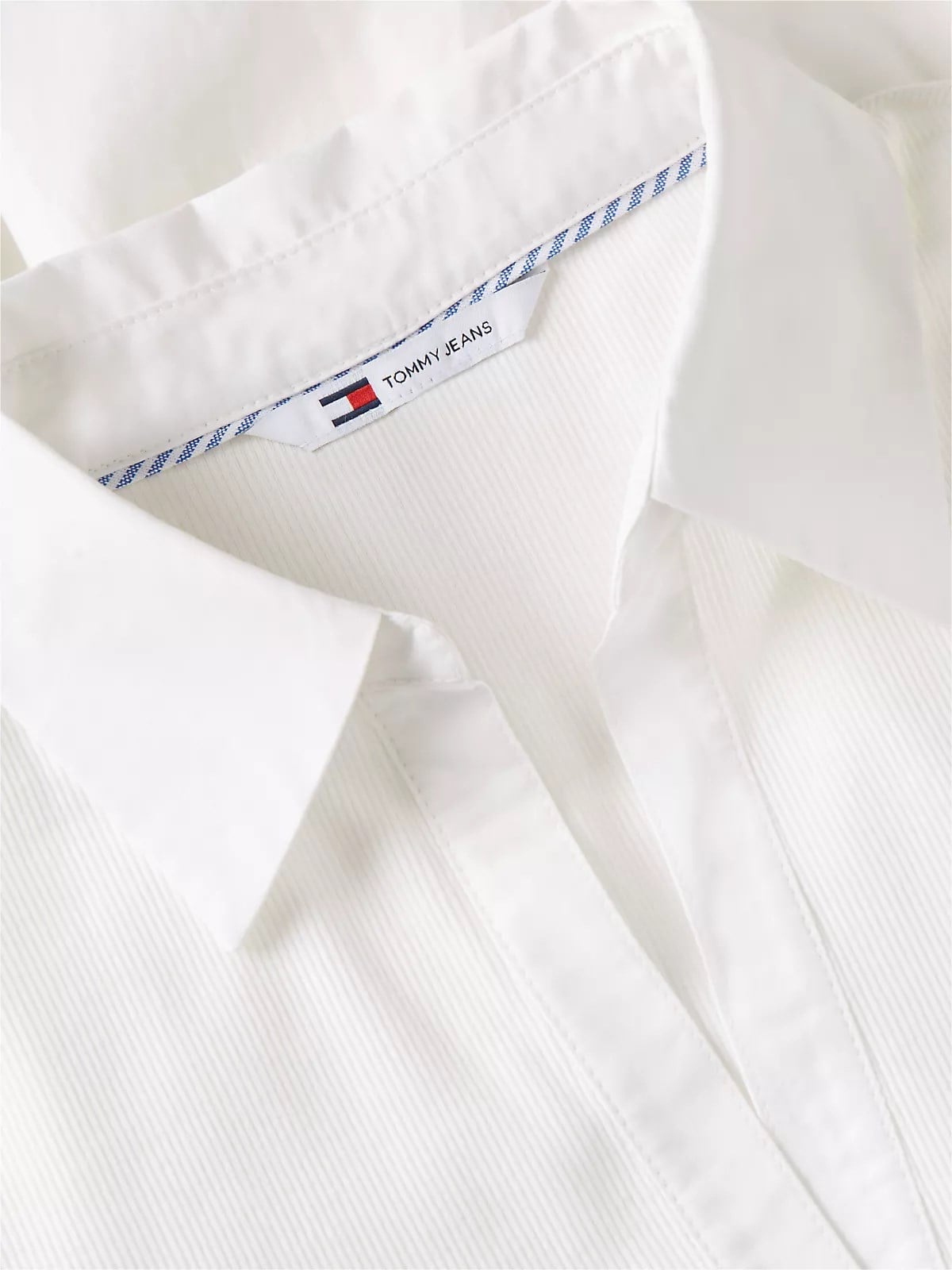 Tommy Hilfiger Tommy Hilfiger Kadın Slim Fit V Yaka İşlemeli Logolu Püsküllü Etek Detaylı Mini Beyaz Elbise DW0DW22331-YBL