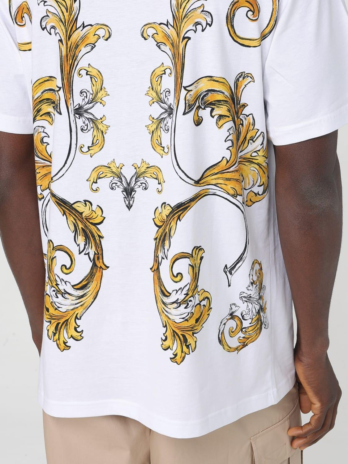 Versace Versace Kadın Regular Fit Yuvarlak Yakalı Cep Detaylı Arkası Grafik Baskılı Kısa Kollu Beyaz-Altın T-Shirt 78GAH6RBJS462-G03