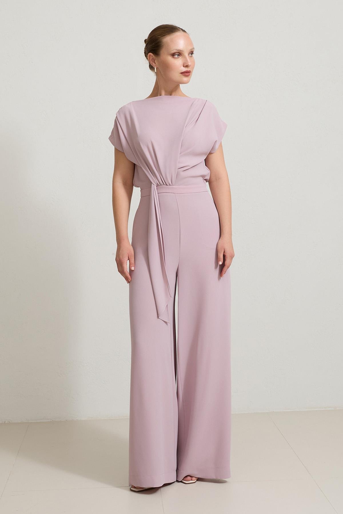 Pudra Bel Detaylı Kolsuz Tulum 