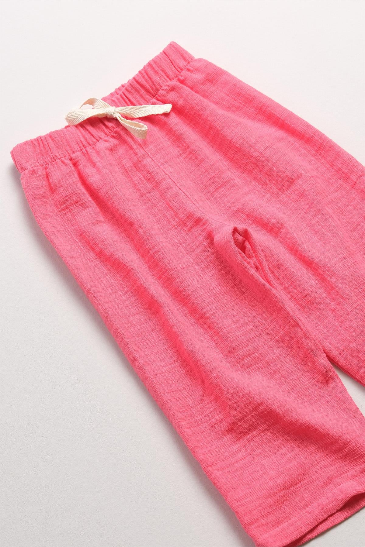 Bonderro Flamlı Müslin Bol Kesim Unisex Çocuk Pantolonu %100 PamukBonderro Flamlı Müslin Bol Kesim Unisex Çocuk Pantolonu %100 Pamuk