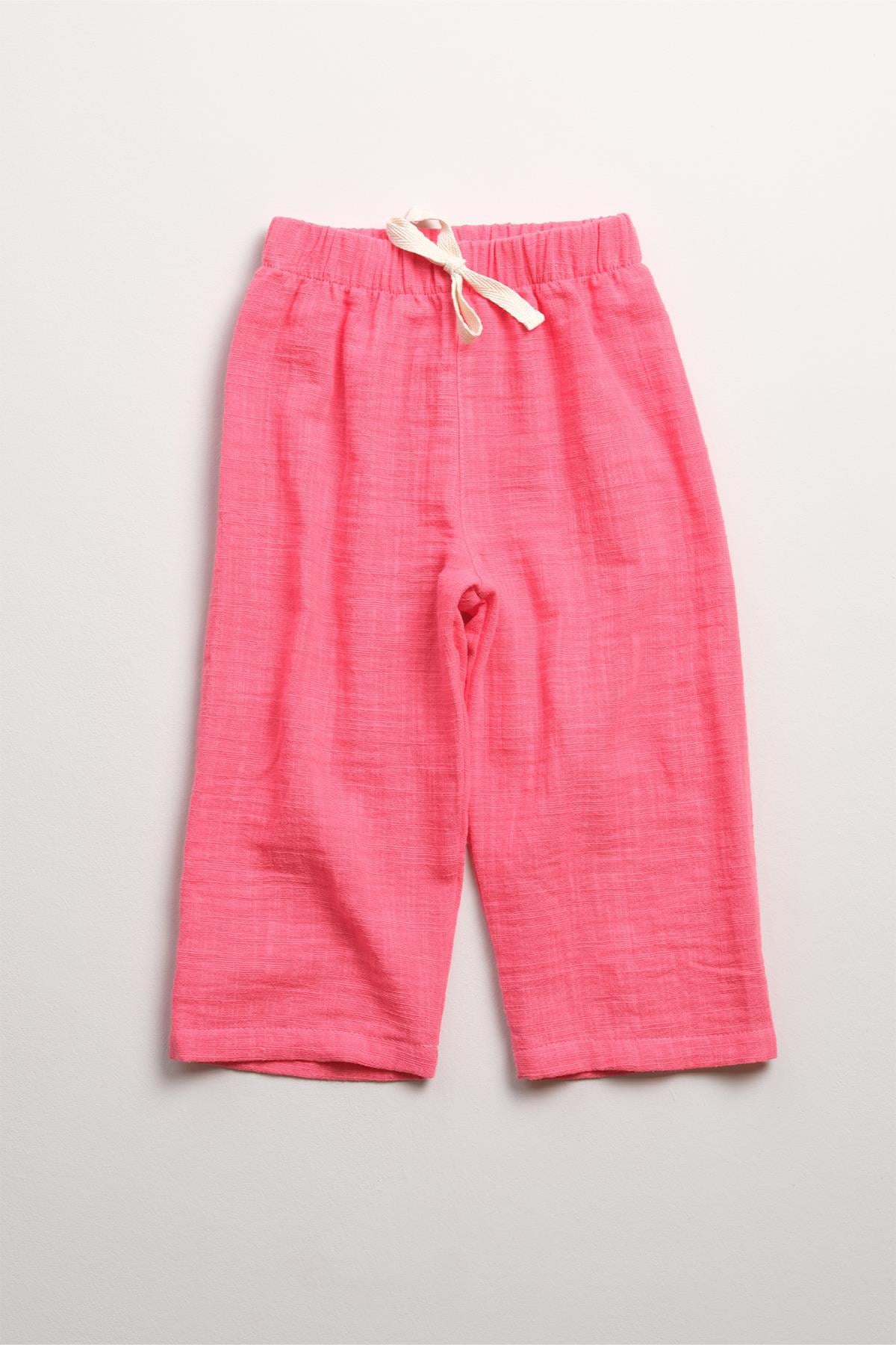 Bonderro Flamlı Müslin Bol Kesim Unisex Çocuk Pantolonu %100 PamukBonderro Flamlı Müslin Bol Kesim Unisex Çocuk Pantolonu %100 Pamuk