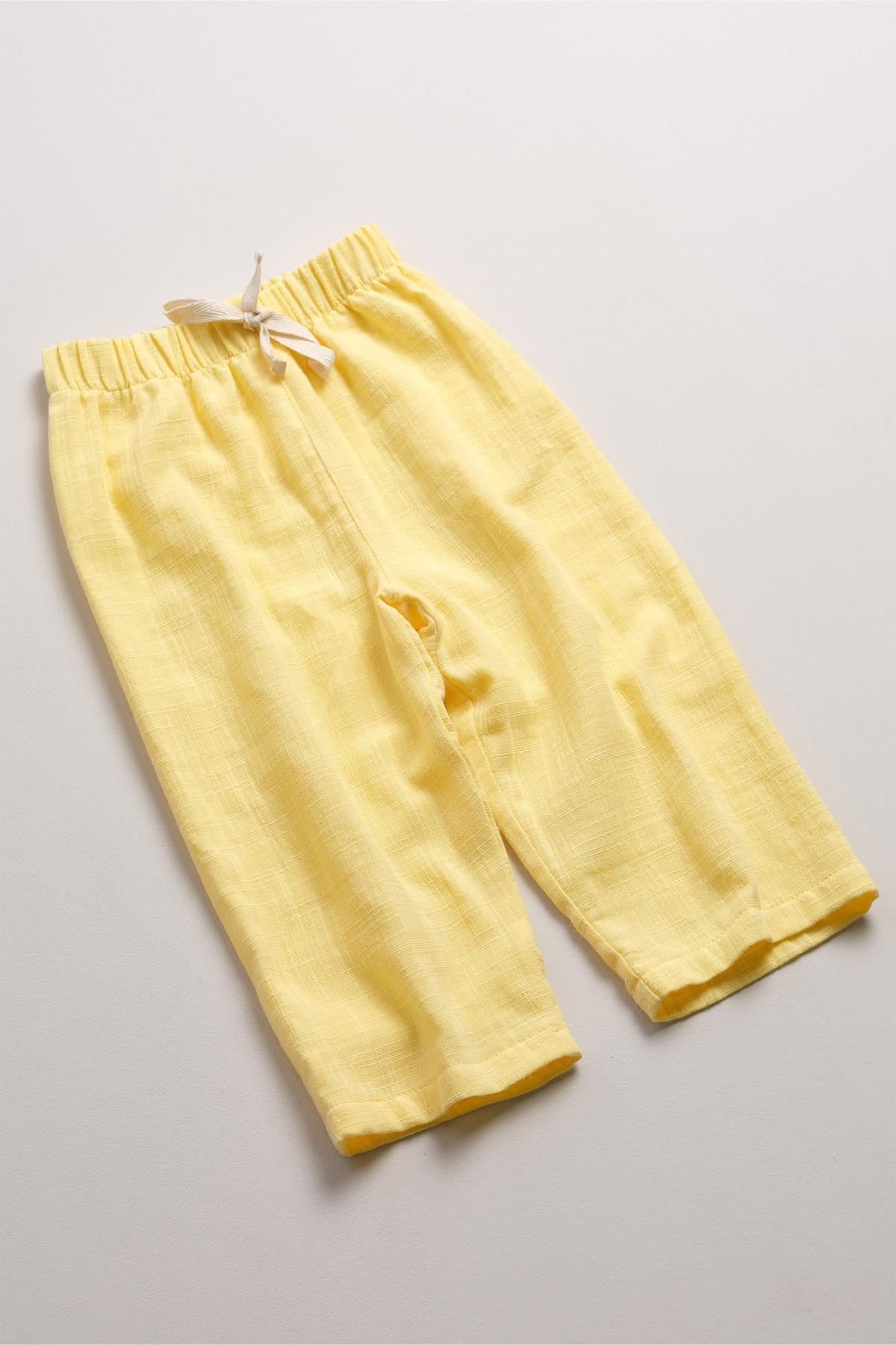 Bonderro Flamlı Müslin Bol Kesim Unisex Çocuk Pantolonu %100 PamukBonderro Flamlı Müslin Bol Kesim Unisex Çocuk Pantolonu %100 Pamuk