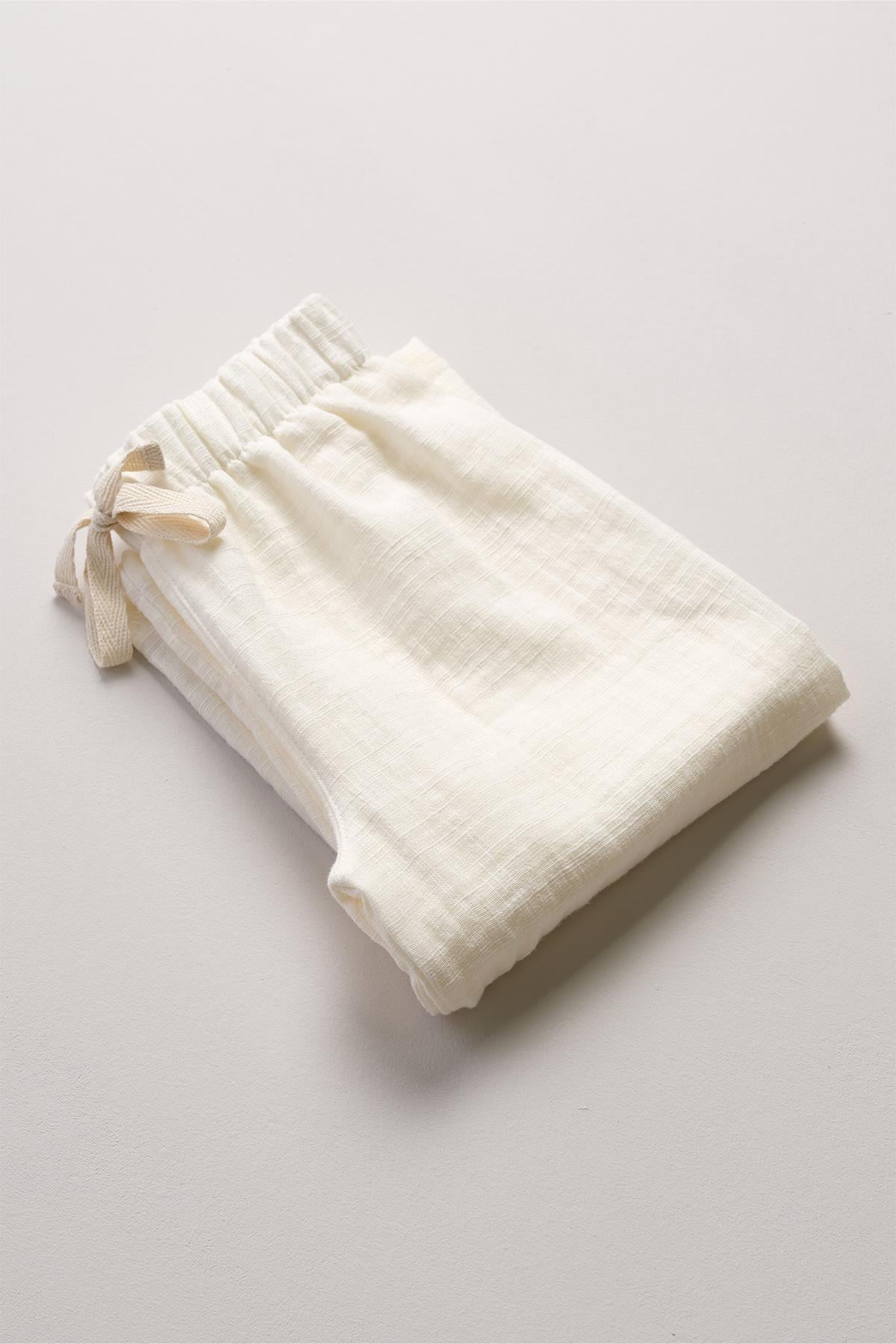 Bonderro Flamlı Müslin Bol Kesim Unisex Çocuk Pantolonu %100 PamukBonderro Flamlı Müslin Bol Kesim Unisex Çocuk Pantolonu %100 Pamuk