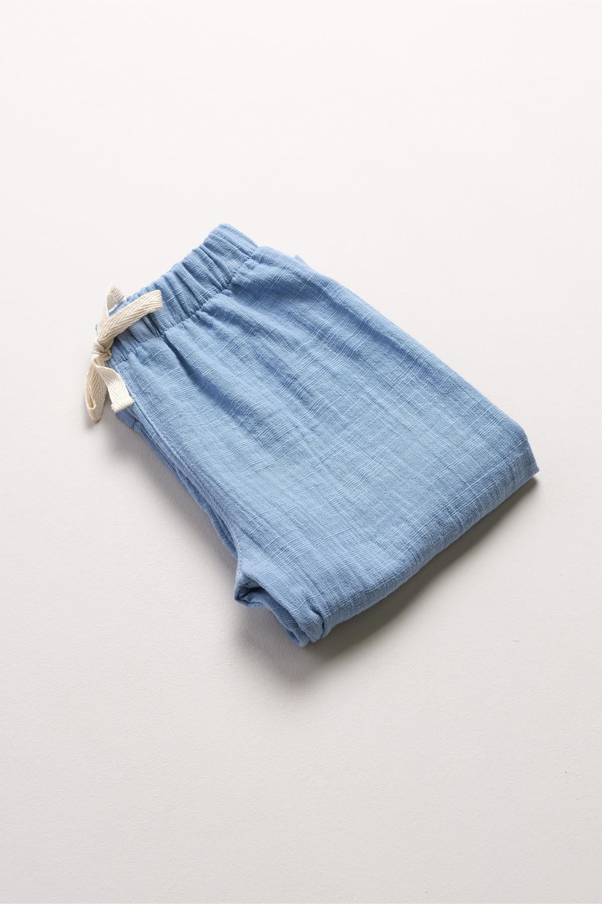 Bonderro Flamlı Müslin Bol Kesim Unisex Çocuk Pantolonu %100 PamukBonderro Flamlı Müslin Bol Kesim Unisex Çocuk Pantolonu %100 Pamuk