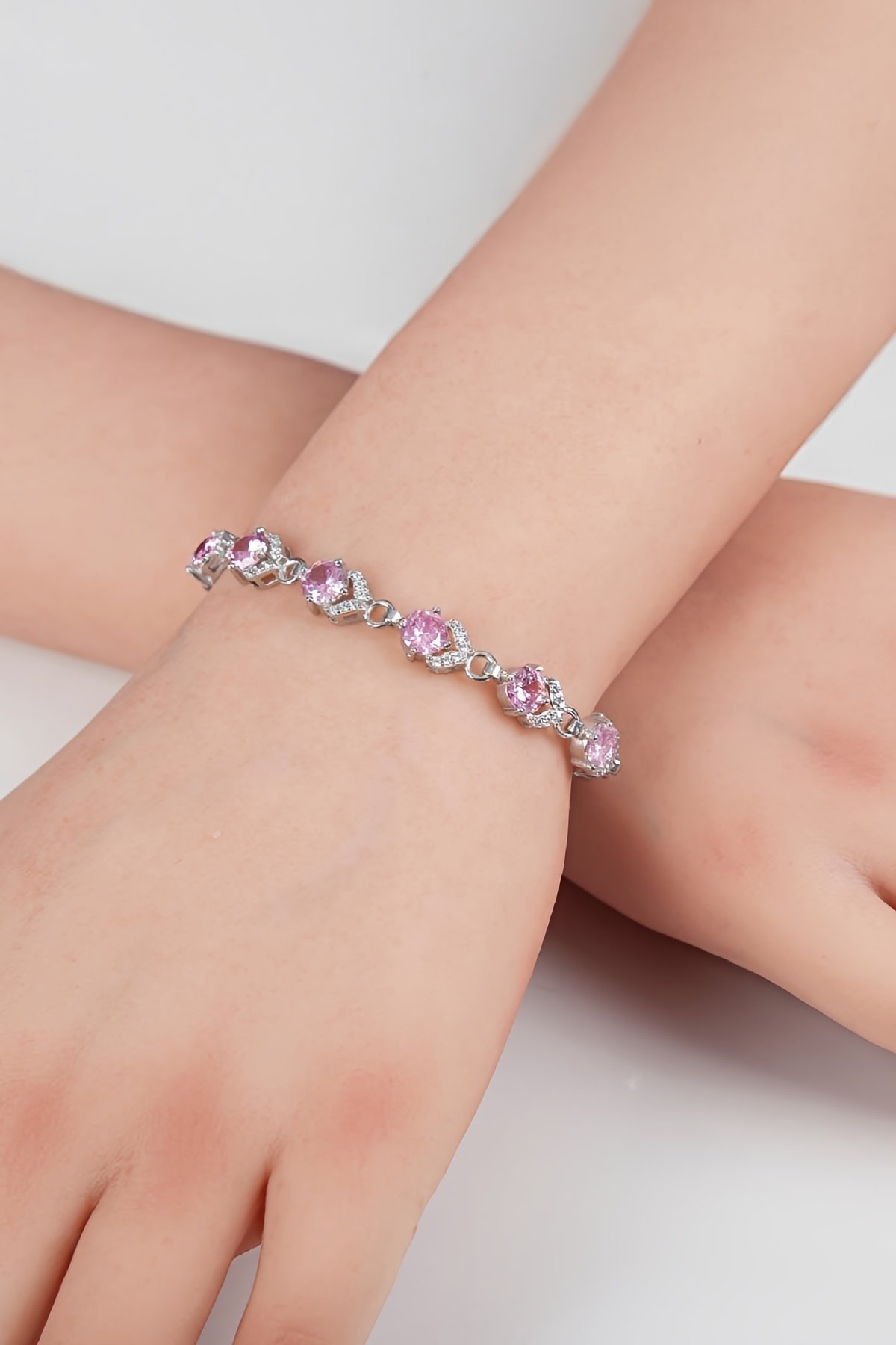 Pembe Zirkon Taşlı Rodyumlu 925 Ayar Gümüş Su Yolu Bayan Bileklik