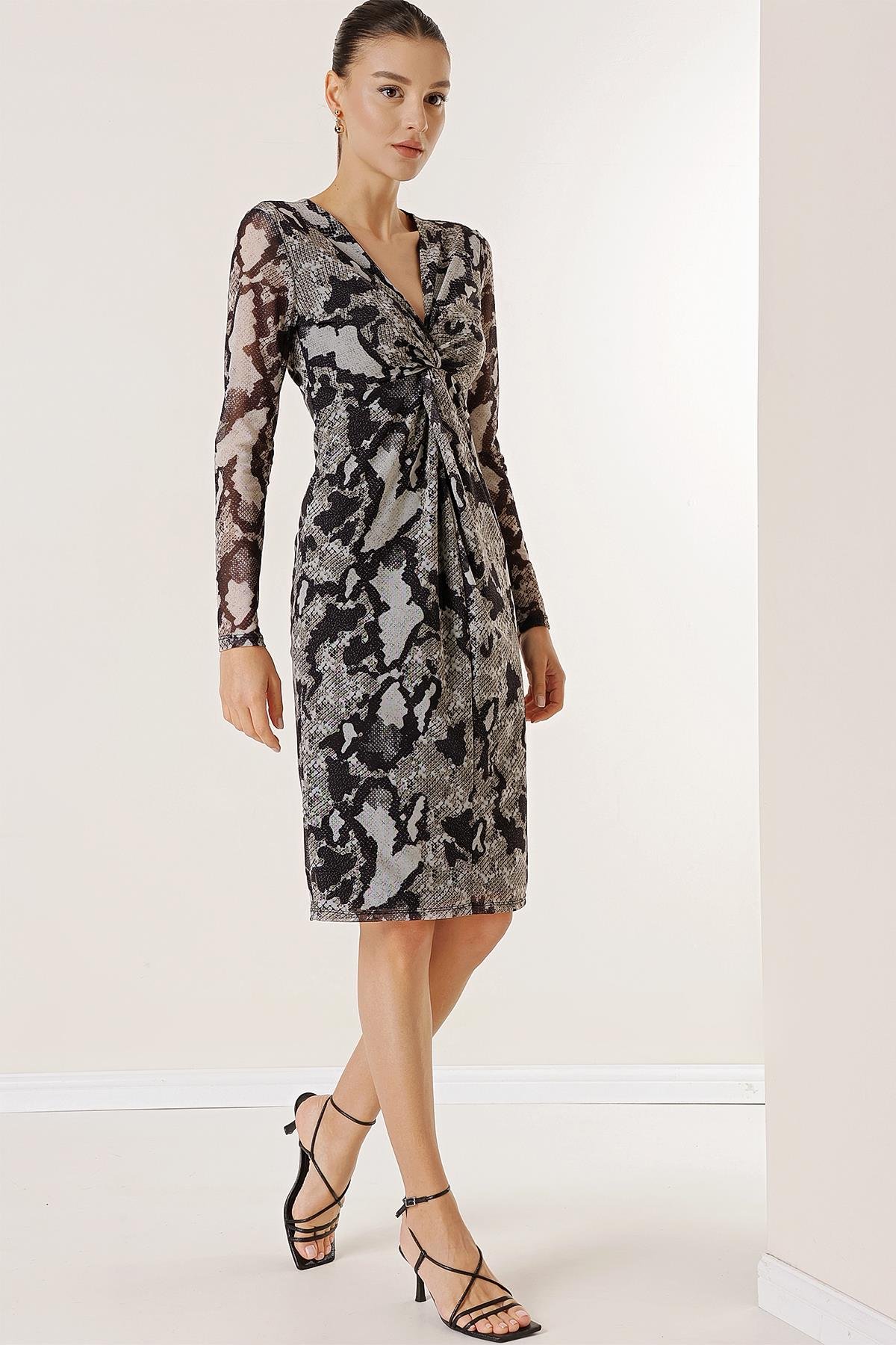 S-23K0840036Dress with knot detail in front and snake skin patterned tulle-lined