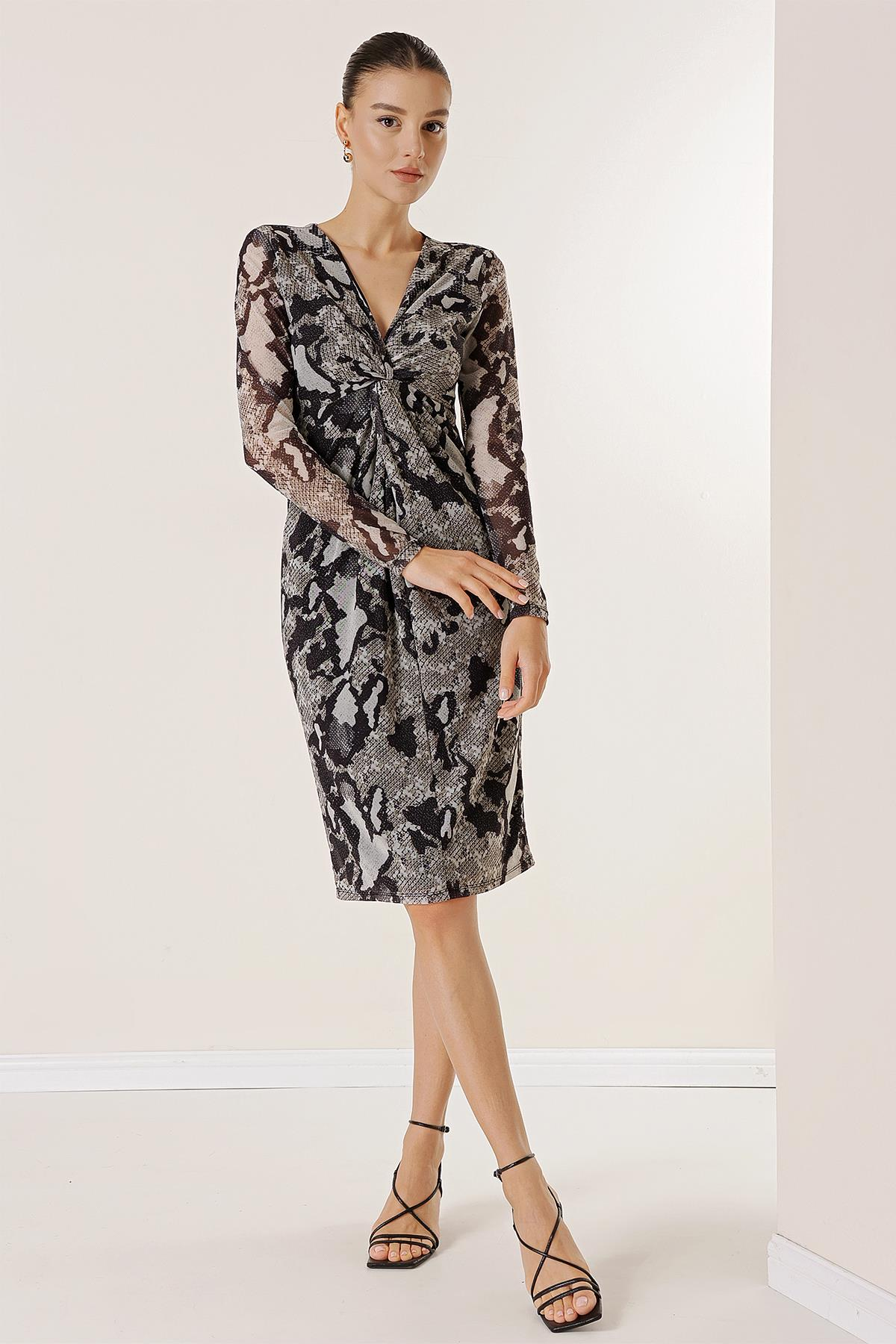 S-23K0840036Dress with knot detail in front and snake skin patterned tulle-lined