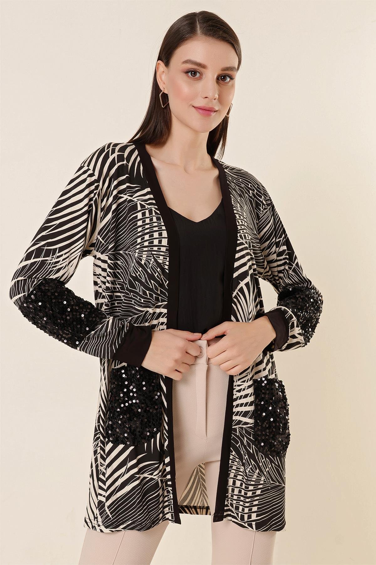 S-23K3160005Leaf Patterned Cardigan with Ruched details and Pockets, made of lycra