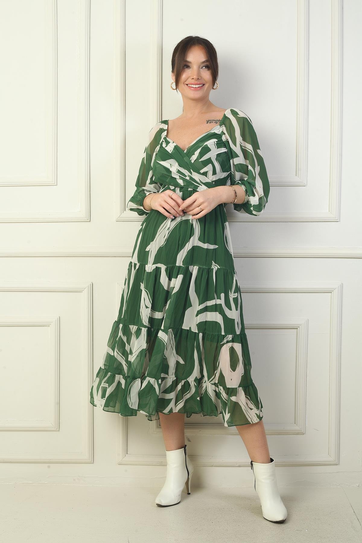 S-24K0840006Madonna Yaka Astarlı Çapraz Bağlamalı Soyut Desen Kruvaze Şifon Elbise