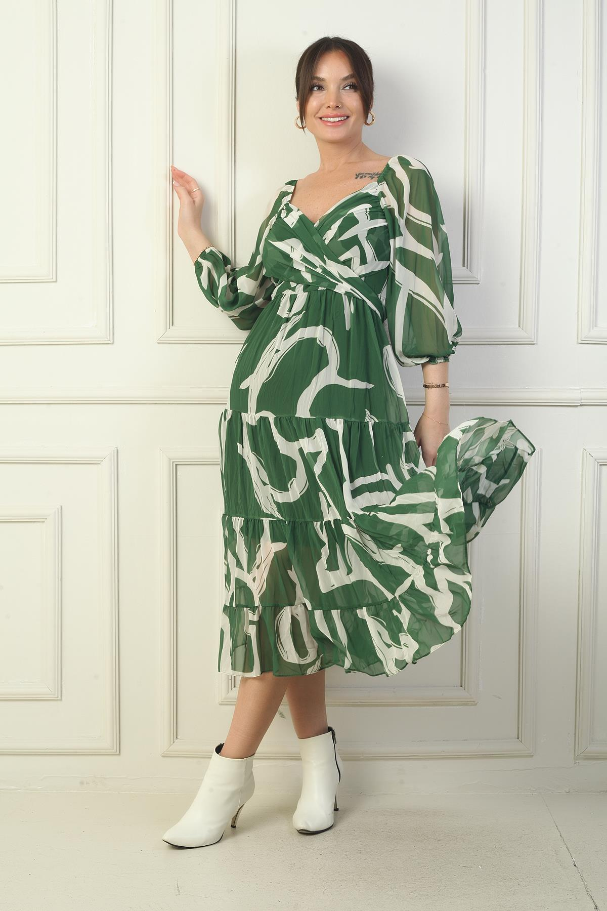 S-24K0840006Madonna Yaka Astarlı Çapraz Bağlamalı Soyut Desen Kruvaze Şifon Elbise