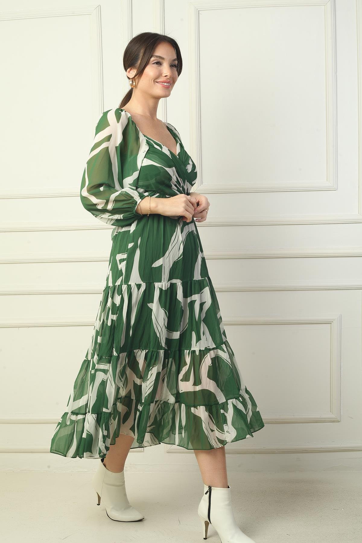 S-24K0840006Madonna Yaka Astarlı Çapraz Bağlamalı Soyut Desen Kruvaze Şifon Elbise