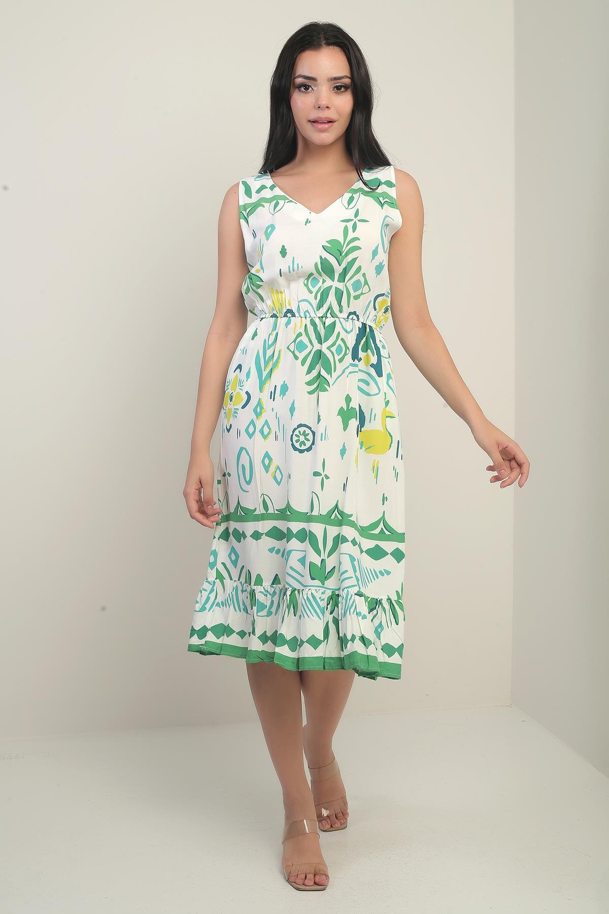 S-25Y3880011Kadın Ön Arka V Yaka Beli Lastikli Cepli Karışık Geometrik Desen Fırfırlı Elbise