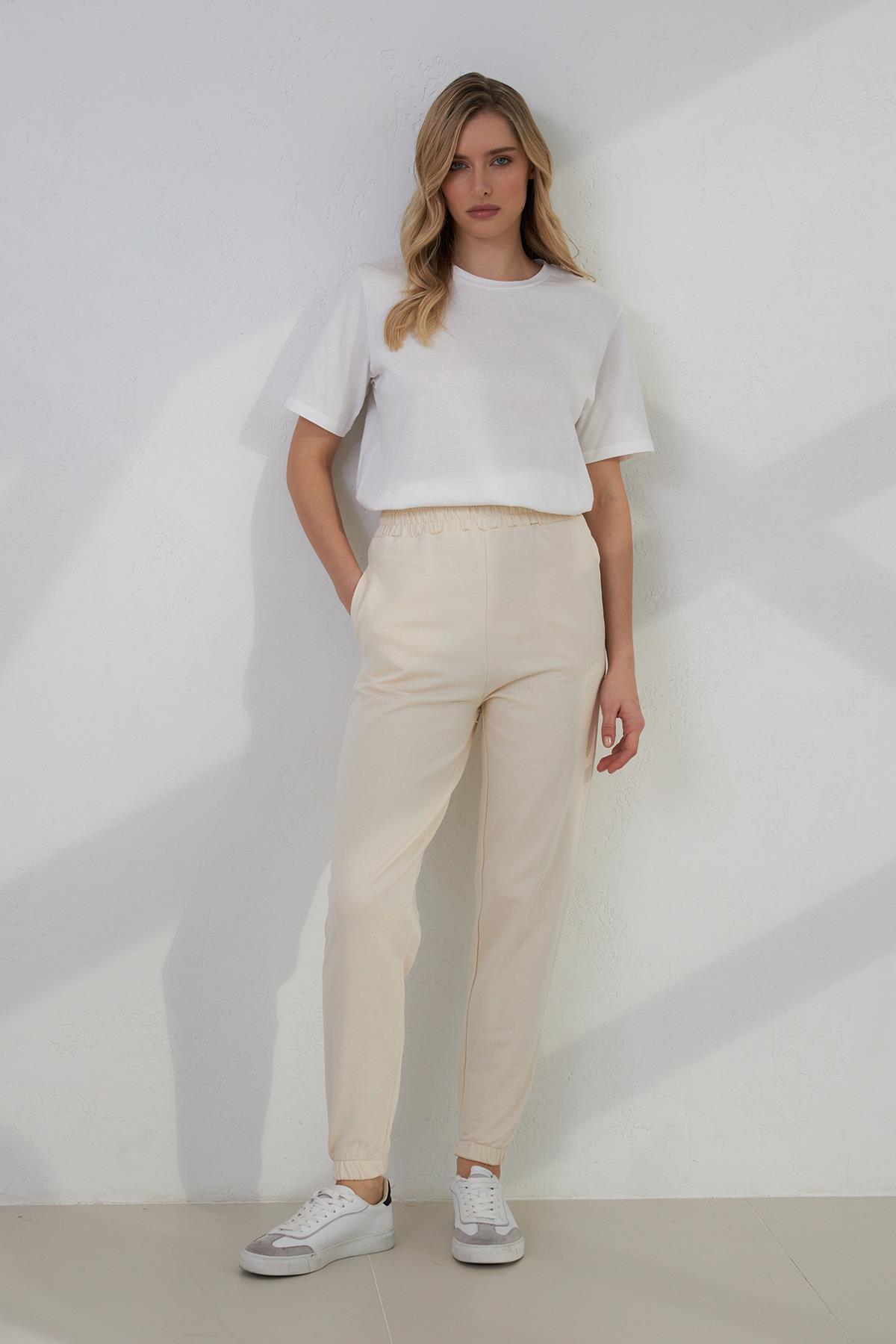 Krem Mini Baskı Detaylı Bilekten Lastikli Rahat Kesim Eşofman Altı Kadın Kategorisiz modelleri