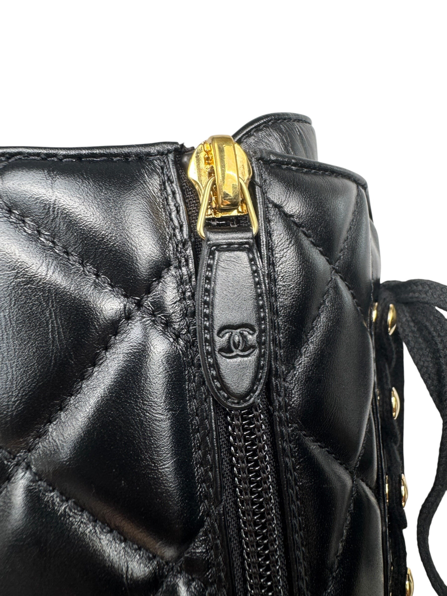 CHANEL CC LOGO QUILTED LEATHER BOOTS