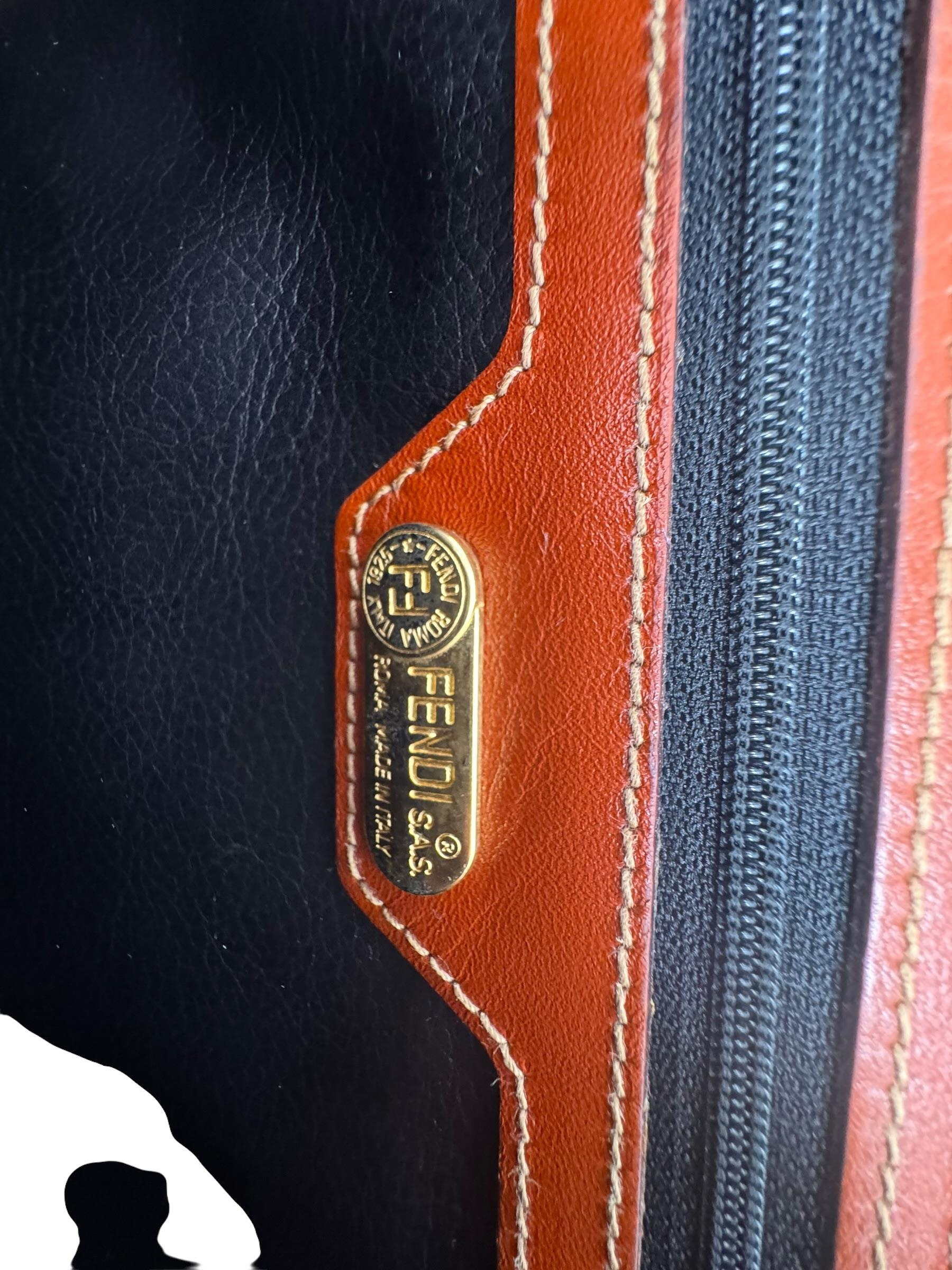 FENDI STRIPPED CANVAS CLUTCH BAG