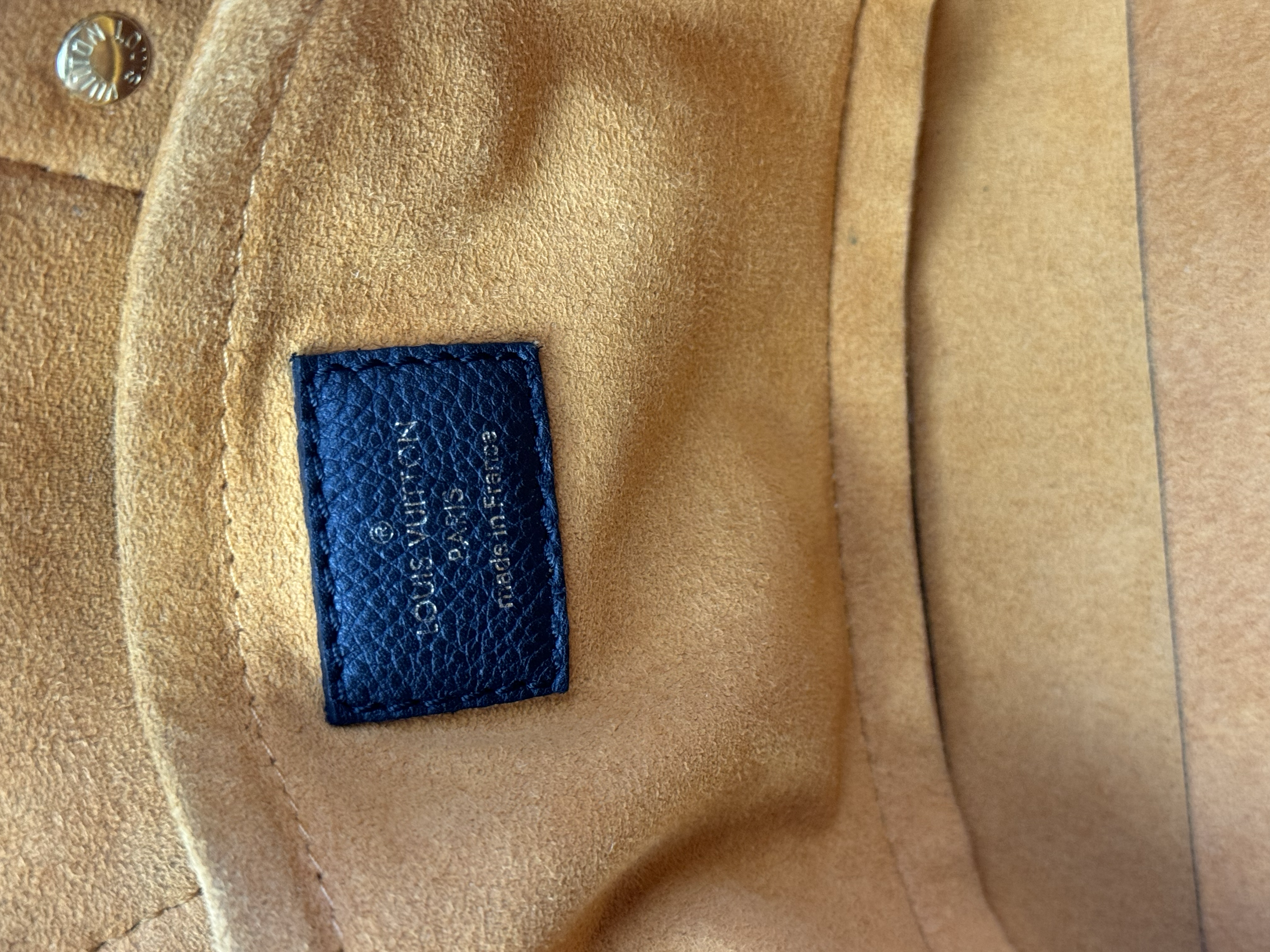 LOUIS VUITTON EMPREINTE NEO ALMA BAG