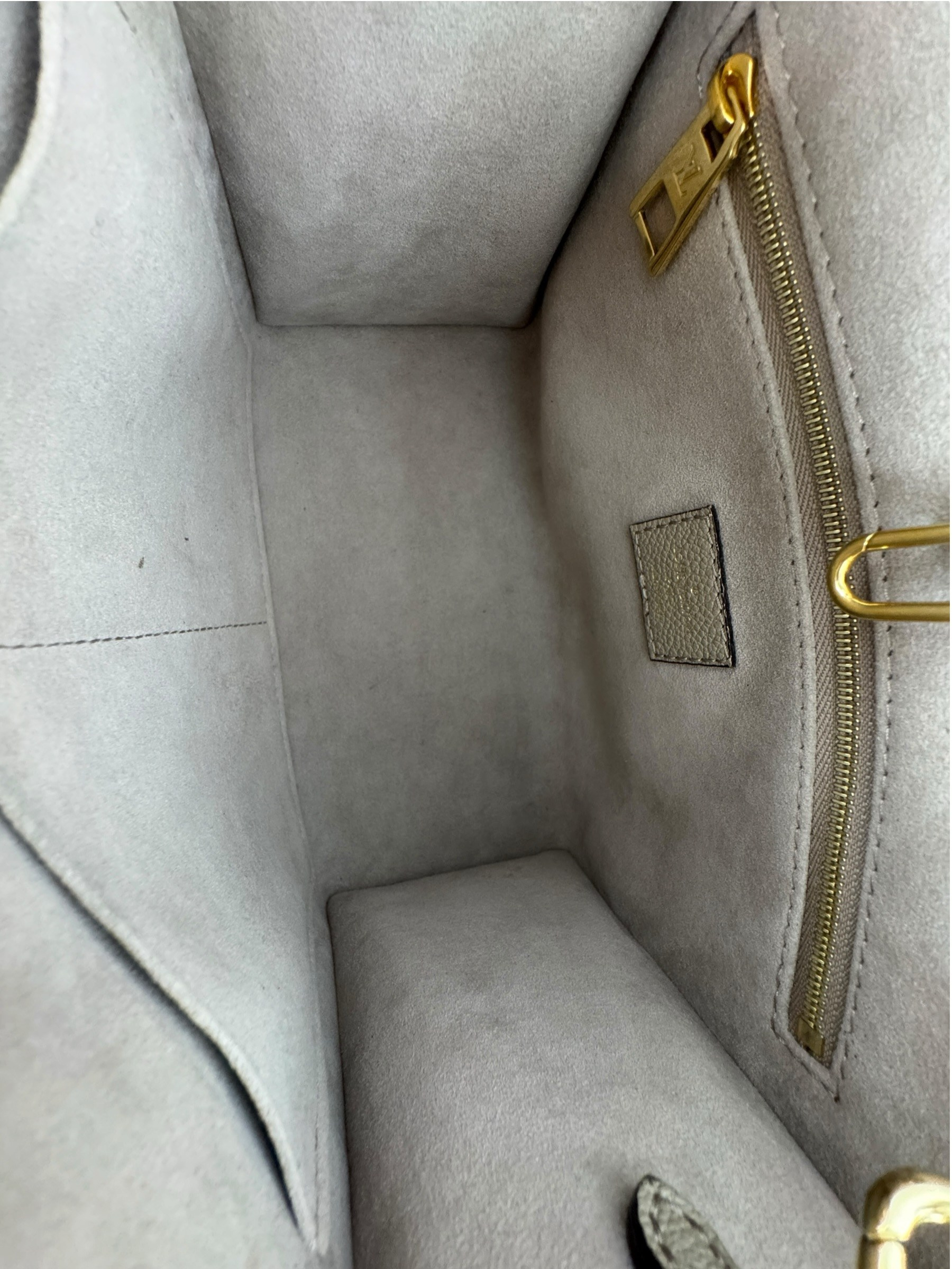 LOUIS VUITTON EMPREINTE ON THE GO PM BAG