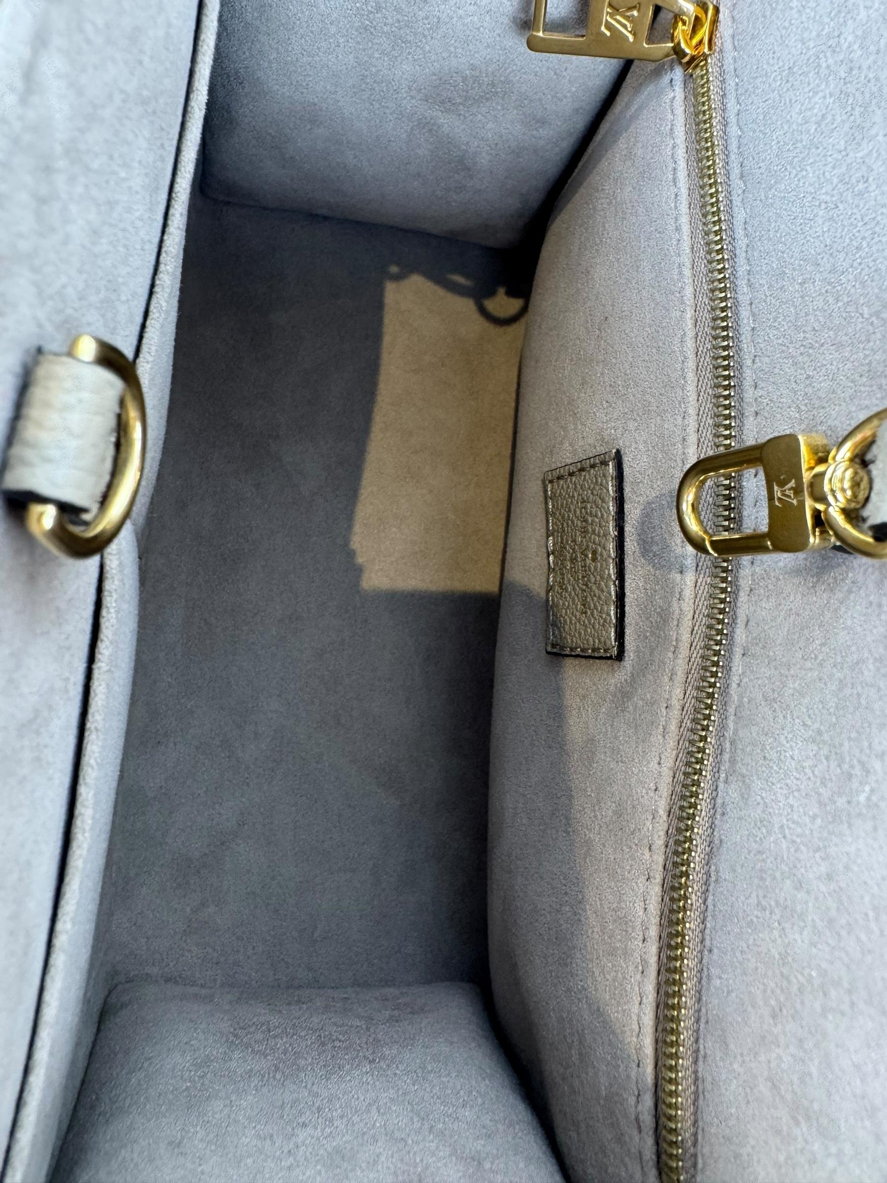 LOUIS VUITTON TOURTERELLE CREME ON THE GO BAG PM