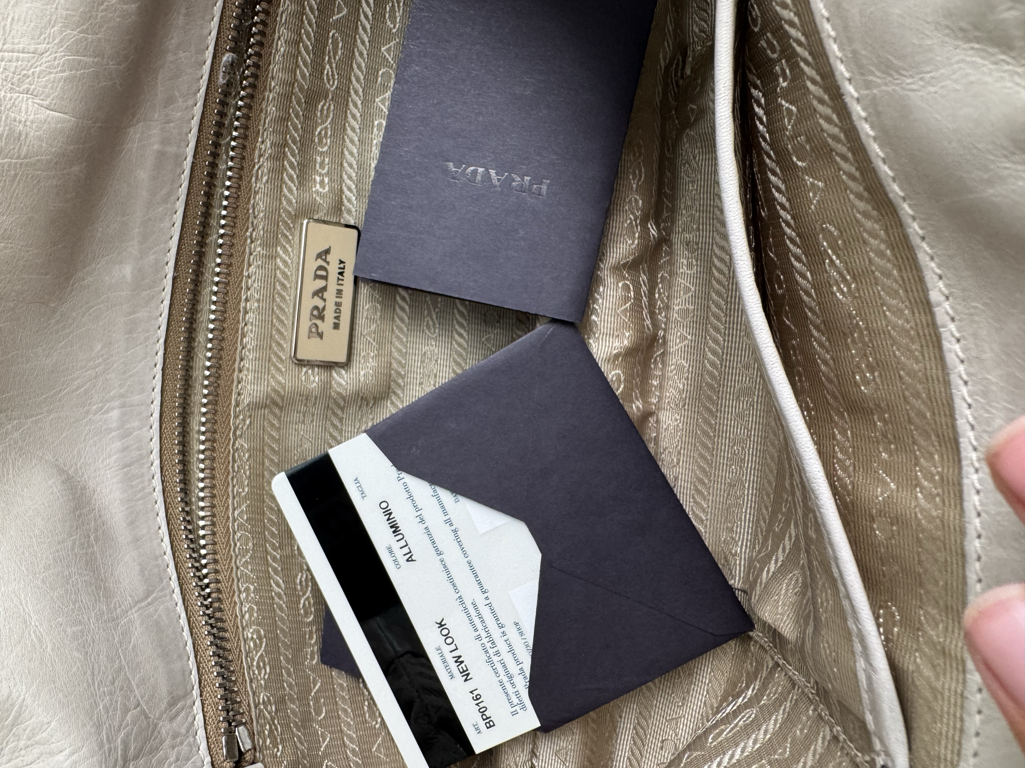 PRADA IVORY CLUTCH BAG