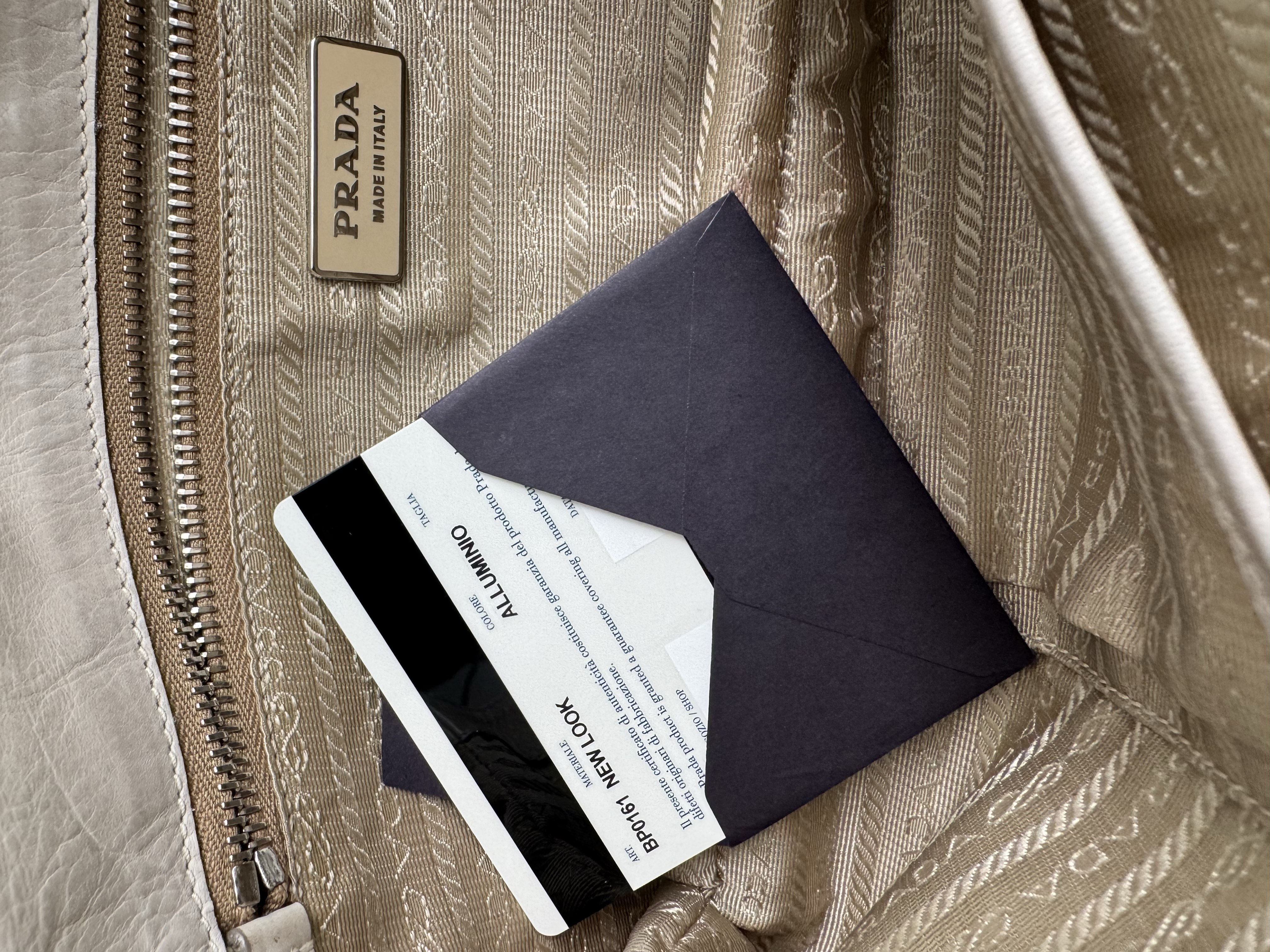 PRADA IVORY CLUTCH BAG
