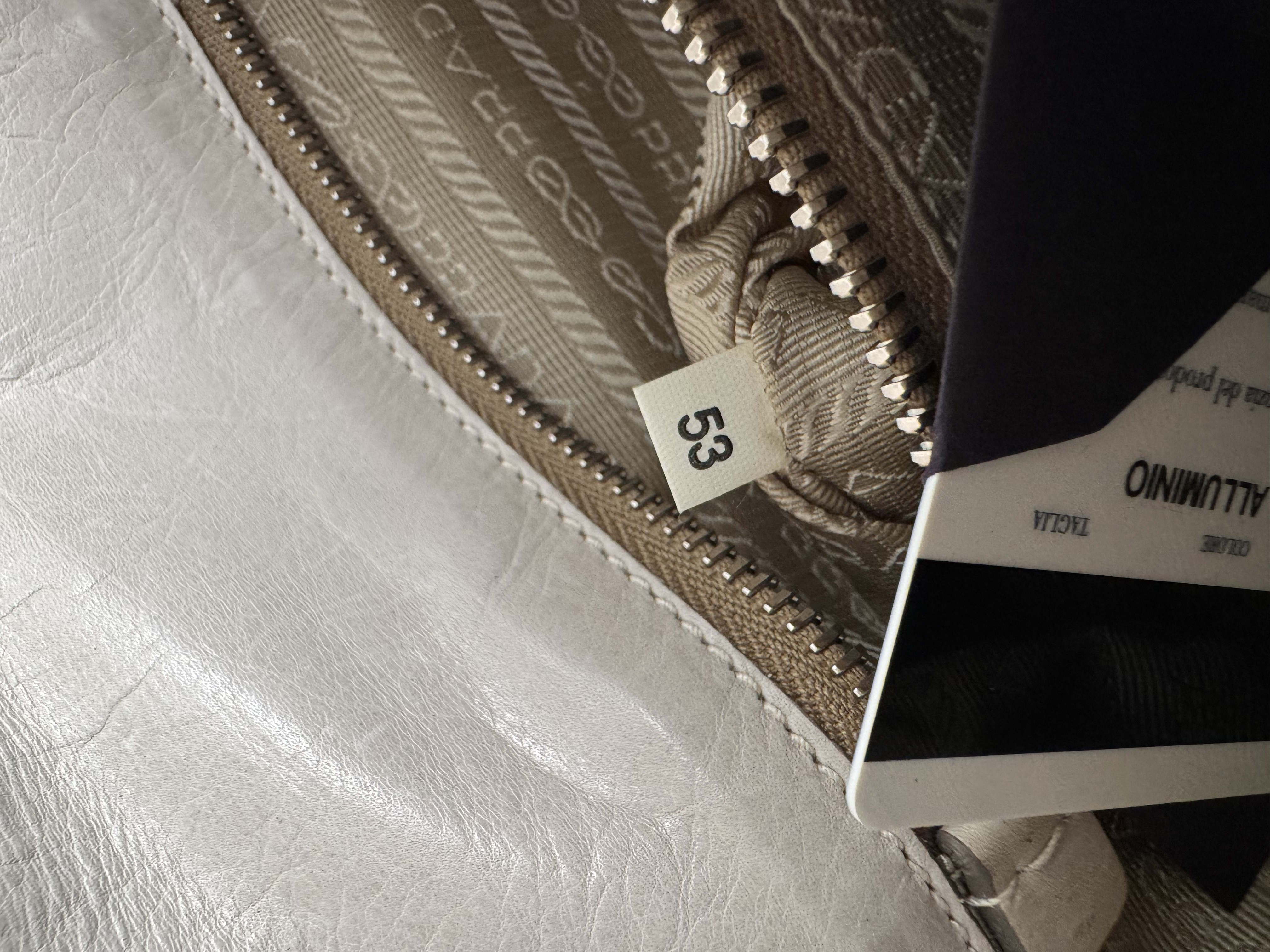 PRADA IVORY CLUTCH BAG