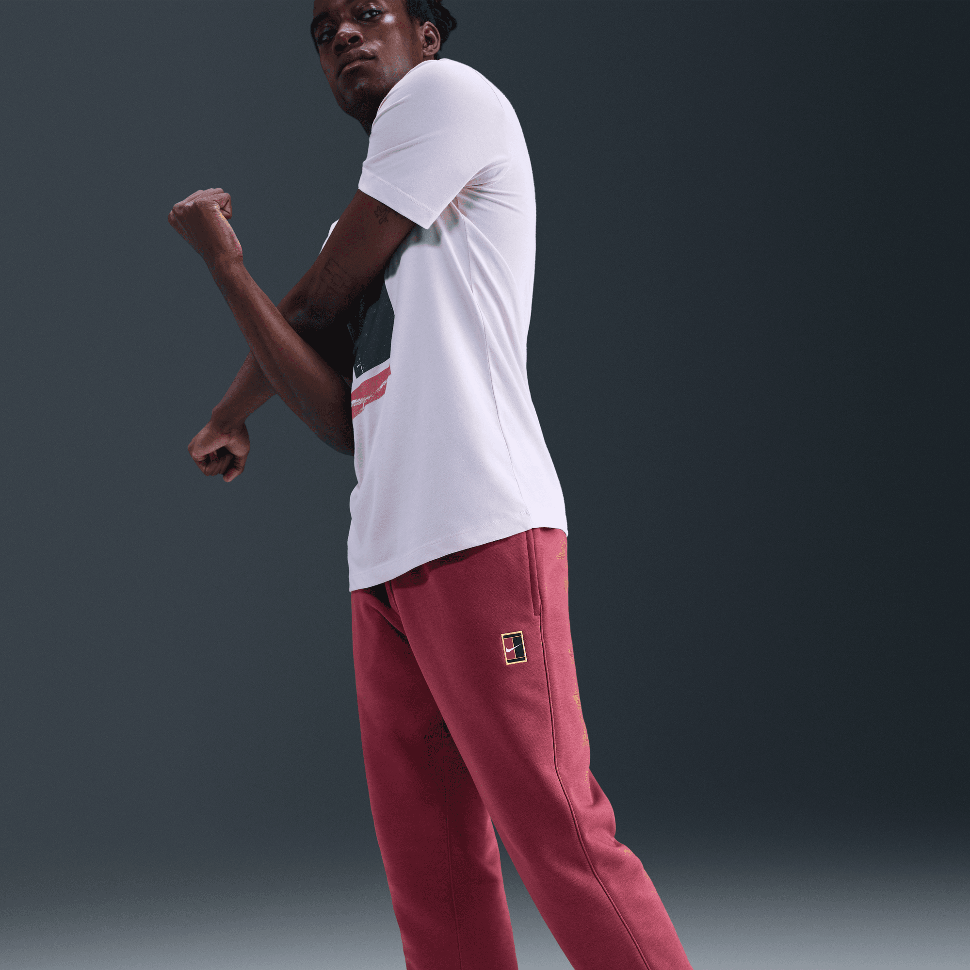 NikeCourt Heritage Dri-FIT Fleece Erkek Tenis Jogger'ı