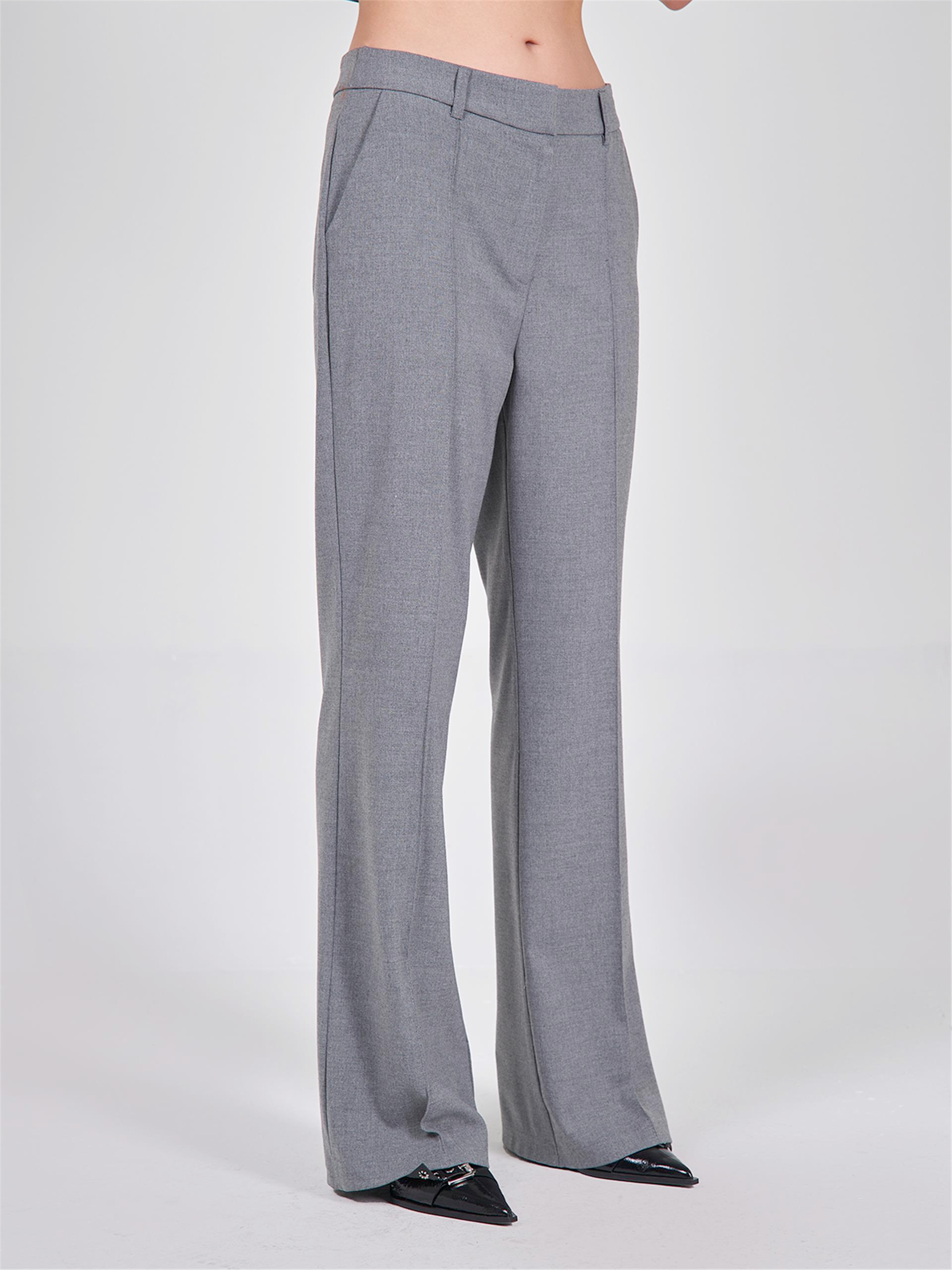 031259 LONG BUSTIER WITH STRAPS AND FLAP POCKETS