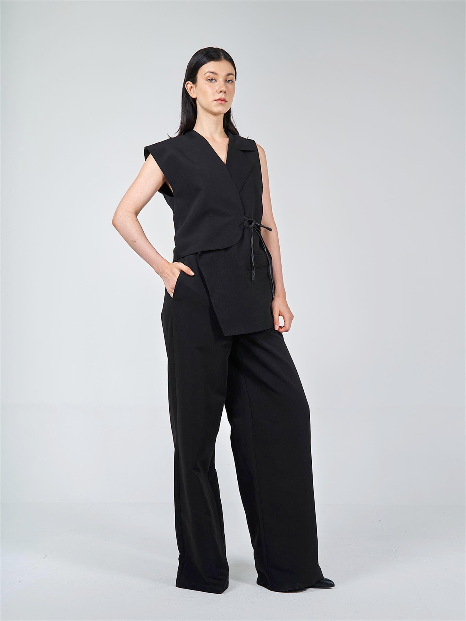 120503 ASYMMETRICAL SLEEVELESS VEST WITH CONTRAST BINDING