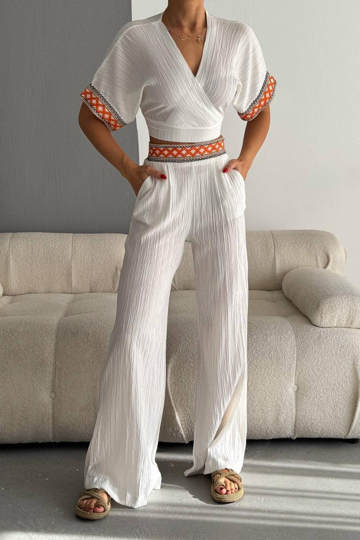 Women cropped blouse and flared pants set wholesale White color 685060