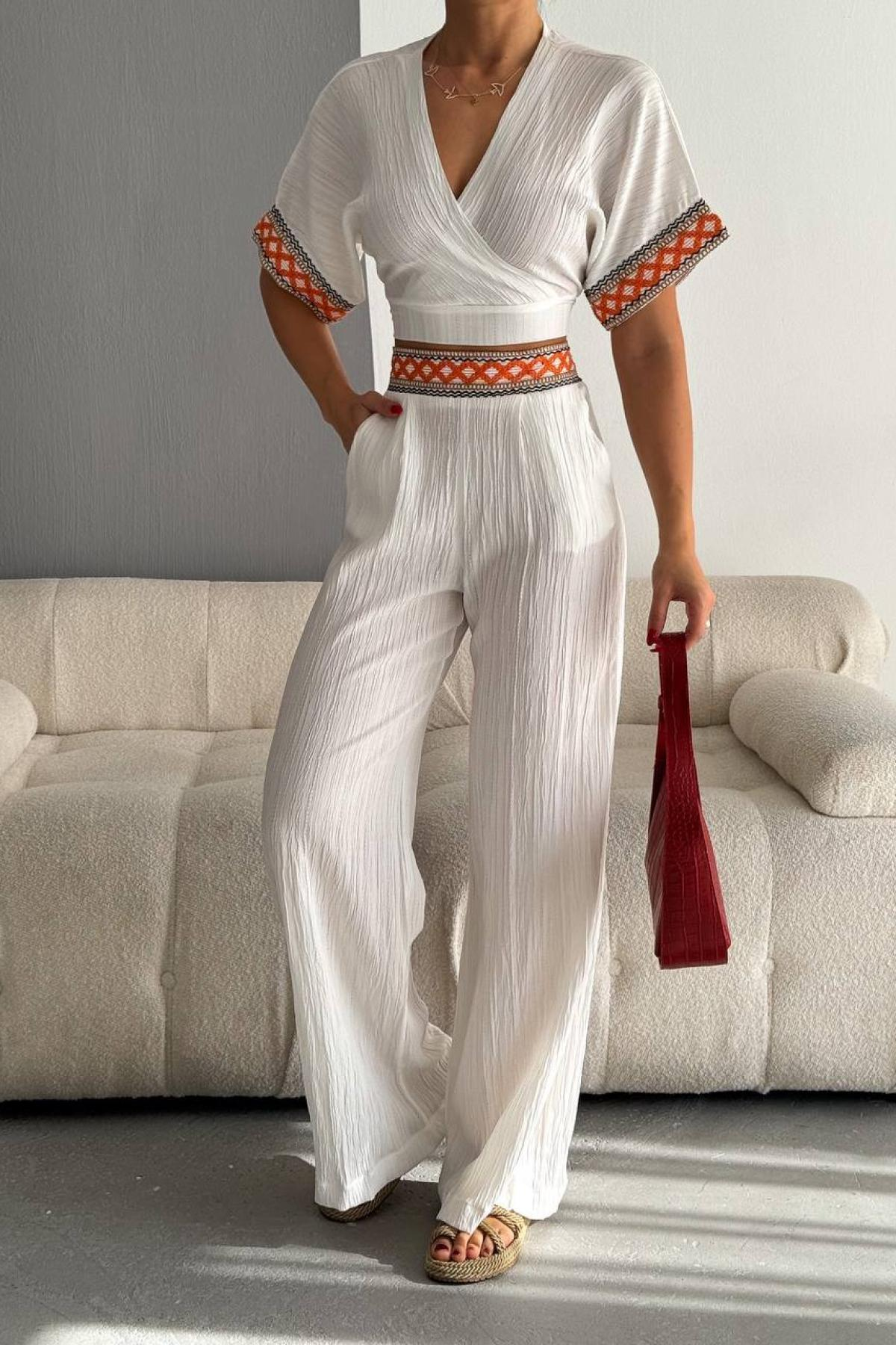 Women cropped blouse and flared pants set wholesale White color 685060