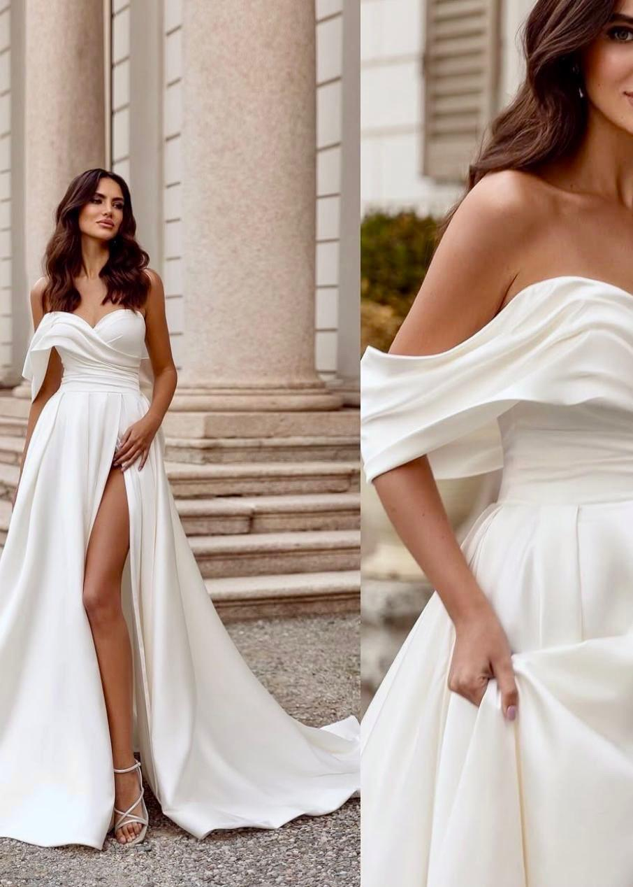 Beyaz Saten Derin Yırtmaç ve Düşük Kol Detaylı Vivid Elegance Gelinlik