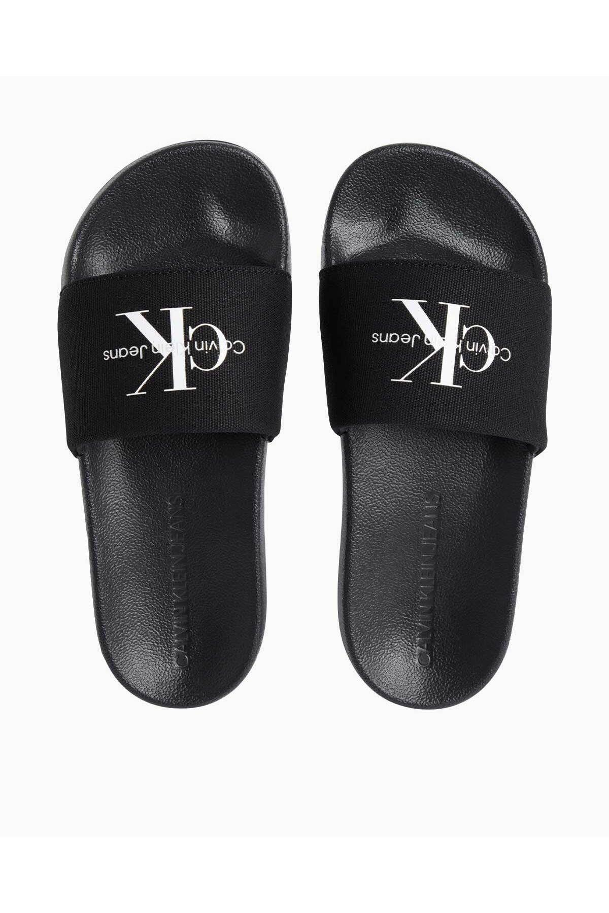 calvin-klein-slide-monogram-flip-flops-9a2-4e.jpg