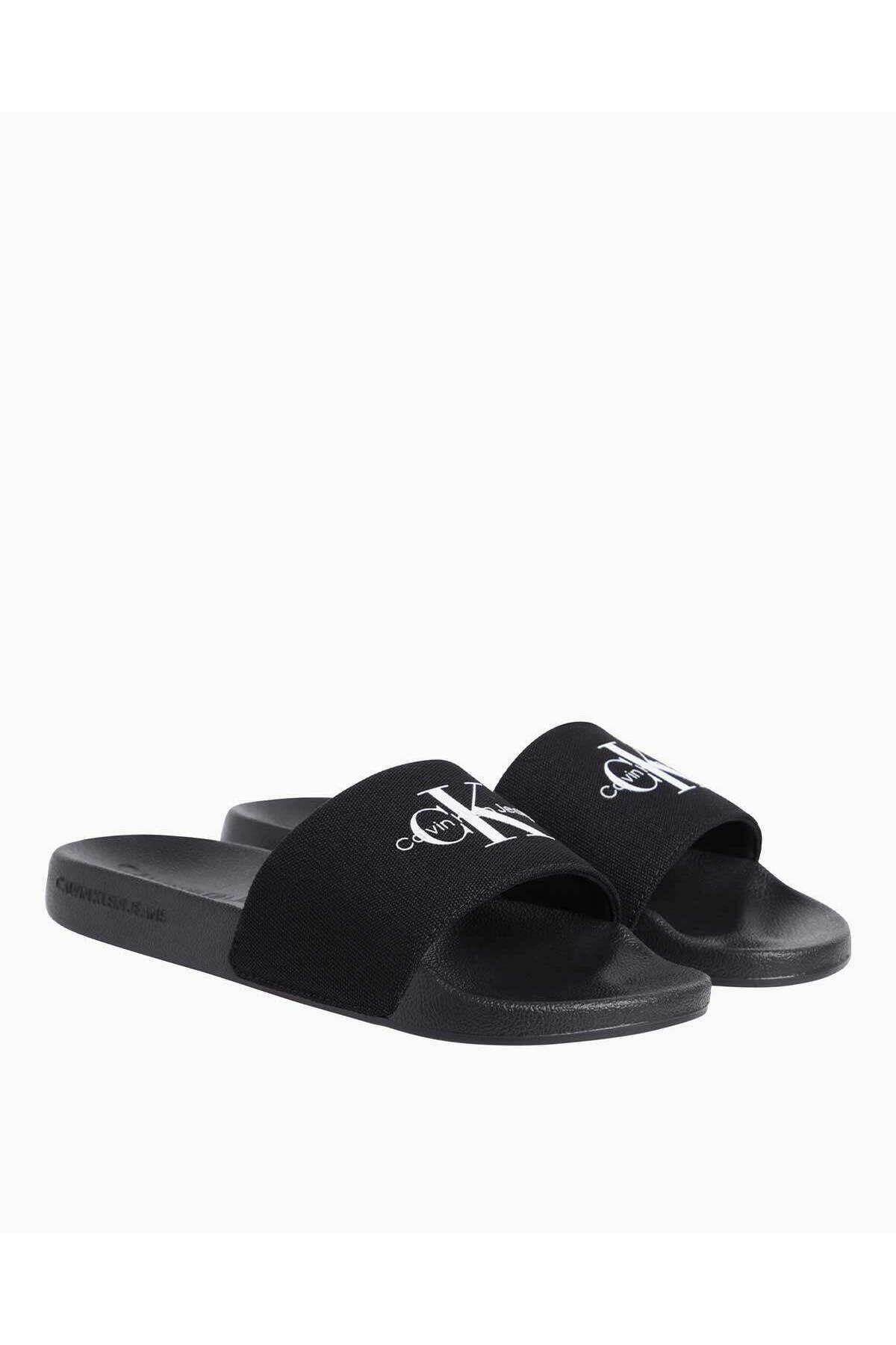 calvin-klein-slide-monogram-flip-flops-a8f48c.jpg